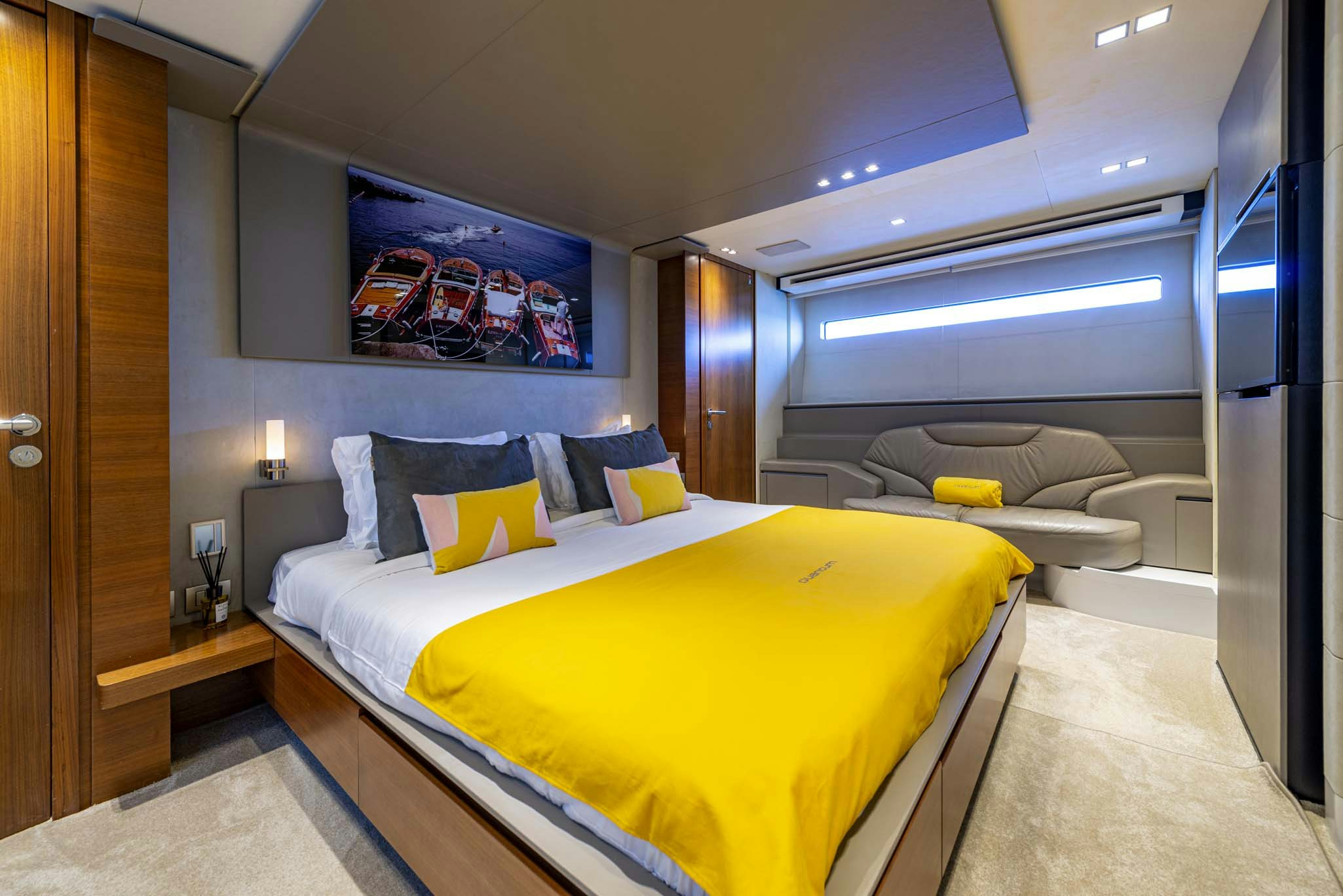 a bed in a room aboard QUANTUM Yacht for Charter