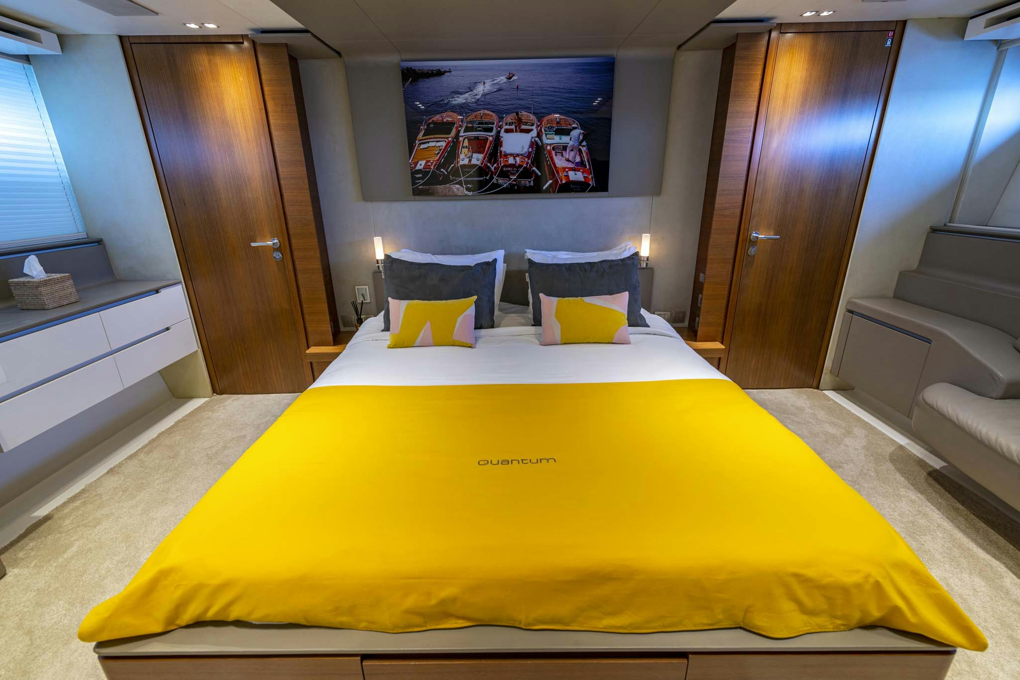 a bed in a room aboard QUANTUM Yacht for Charter