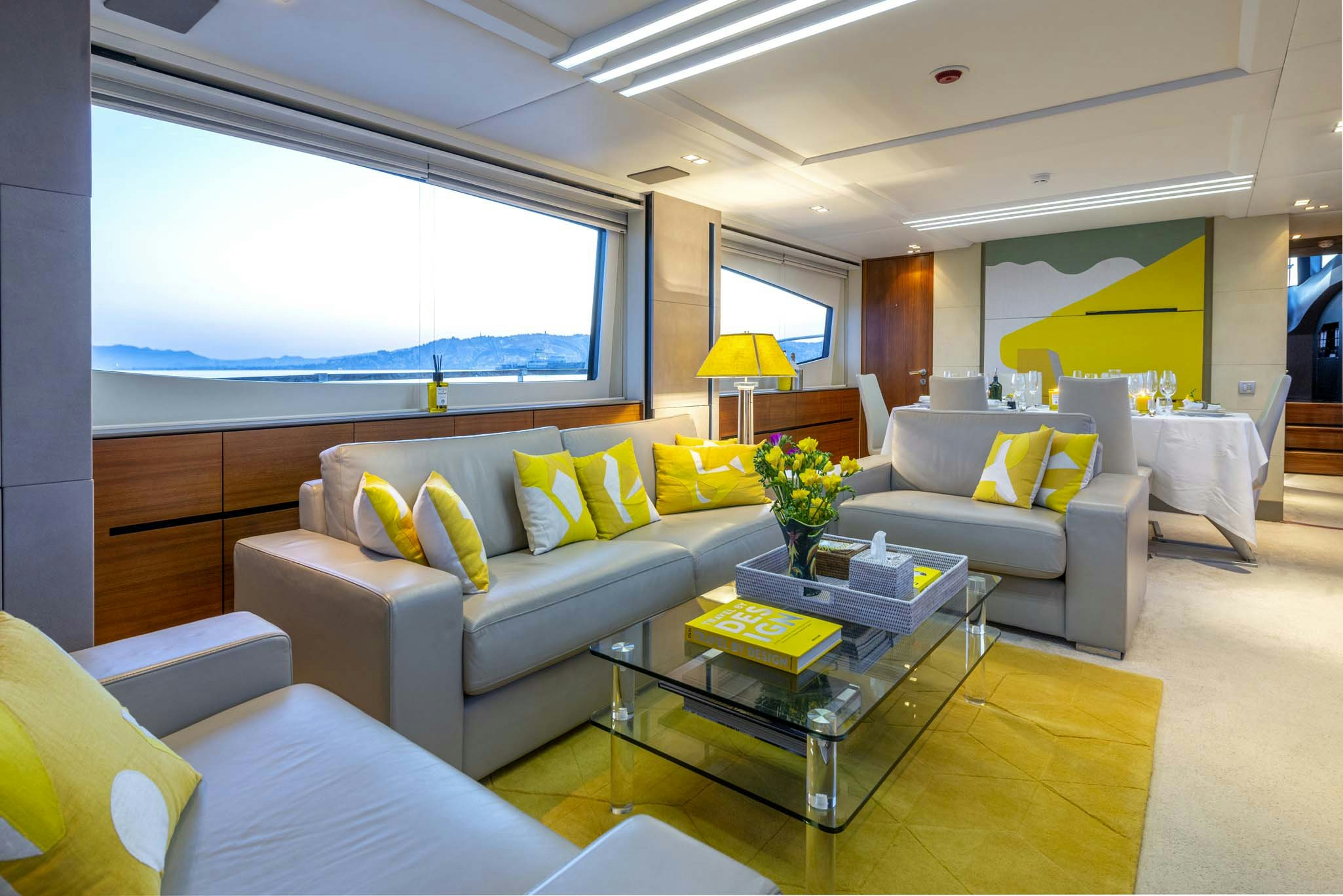 a living room with a large window aboard QUANTUM Yacht for Sale