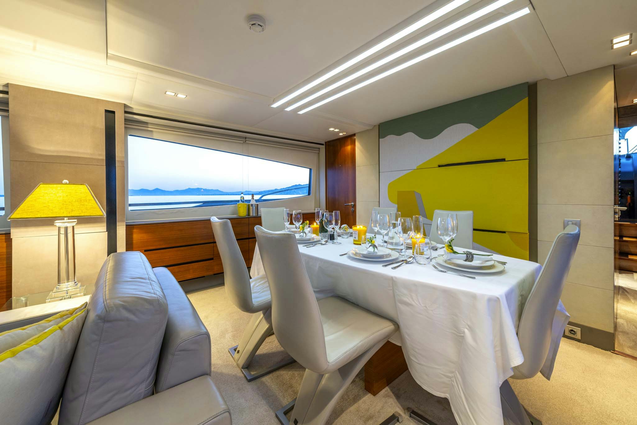 a conference room with a table and chairs aboard QUANTUM Yacht for Sale
