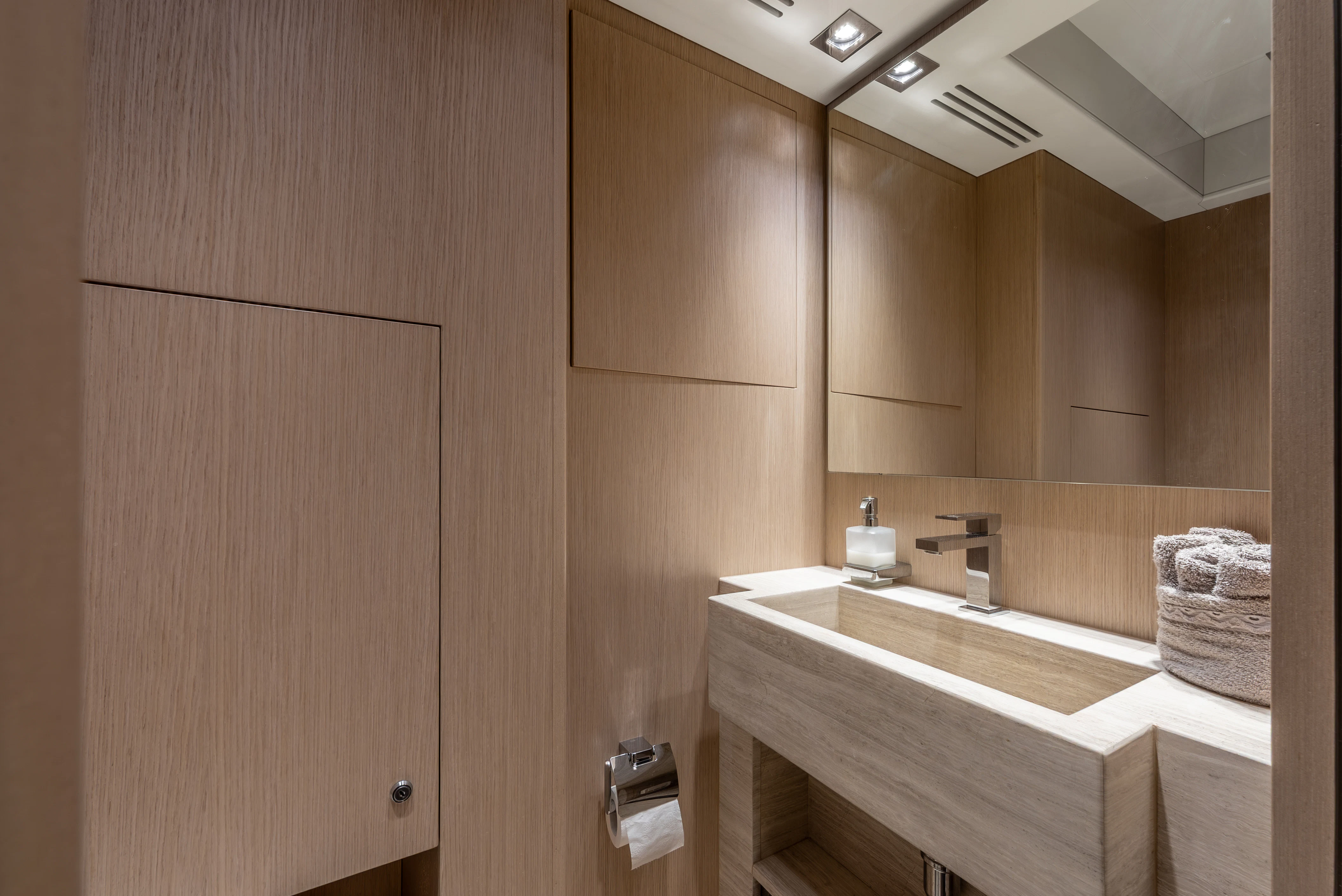 a bathroom with wooden cabinets aboard ZALANKA Yacht for Sale