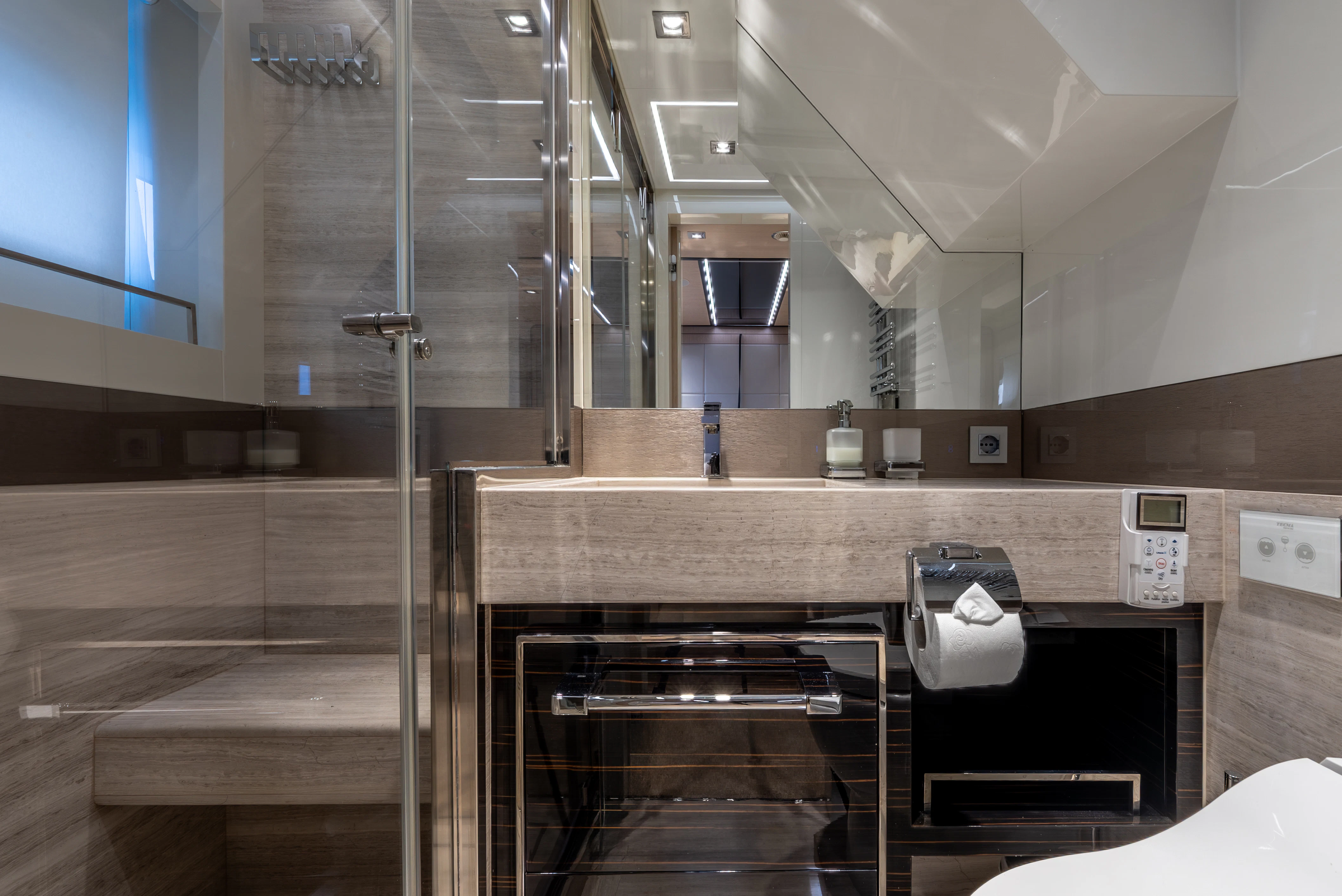 a bathroom with a large glass shower aboard ZALANKA Yacht for Sale