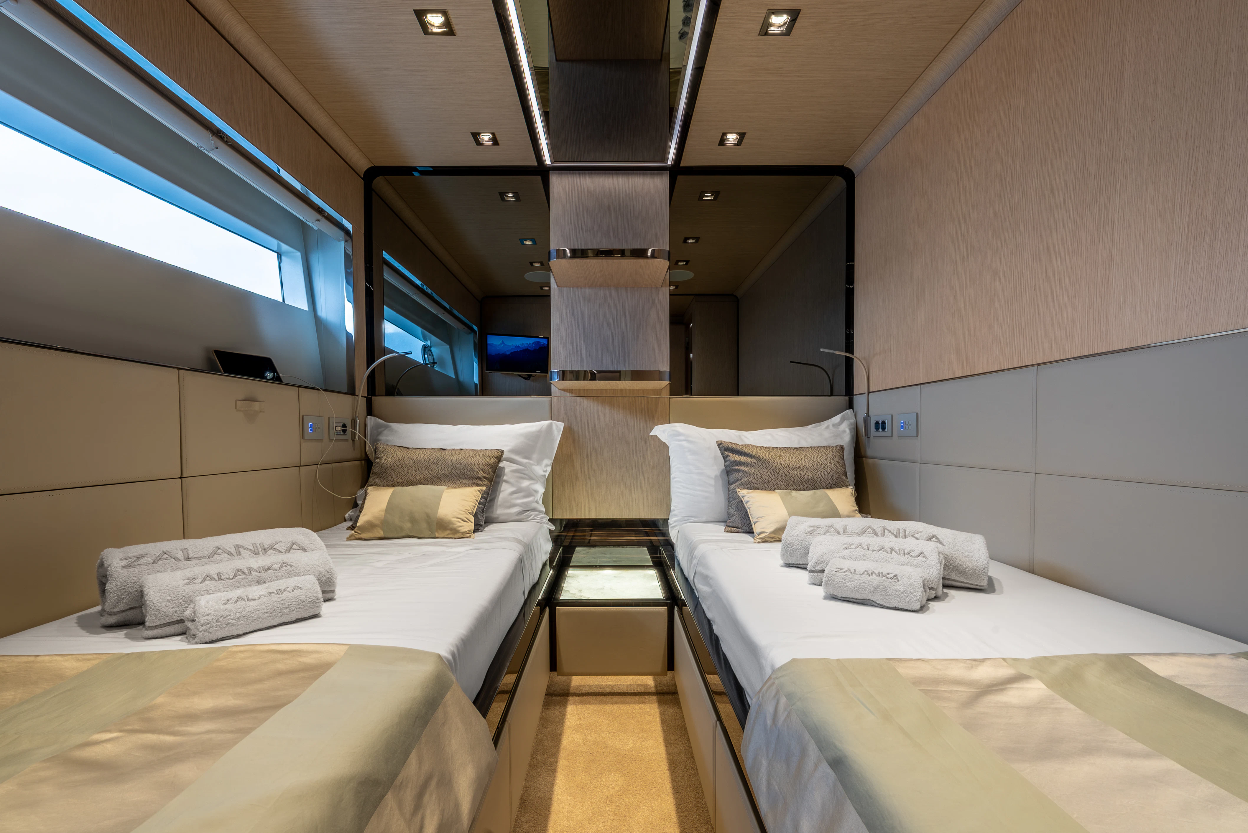 a room with beds and a window aboard ZALANKA Yacht for Sale