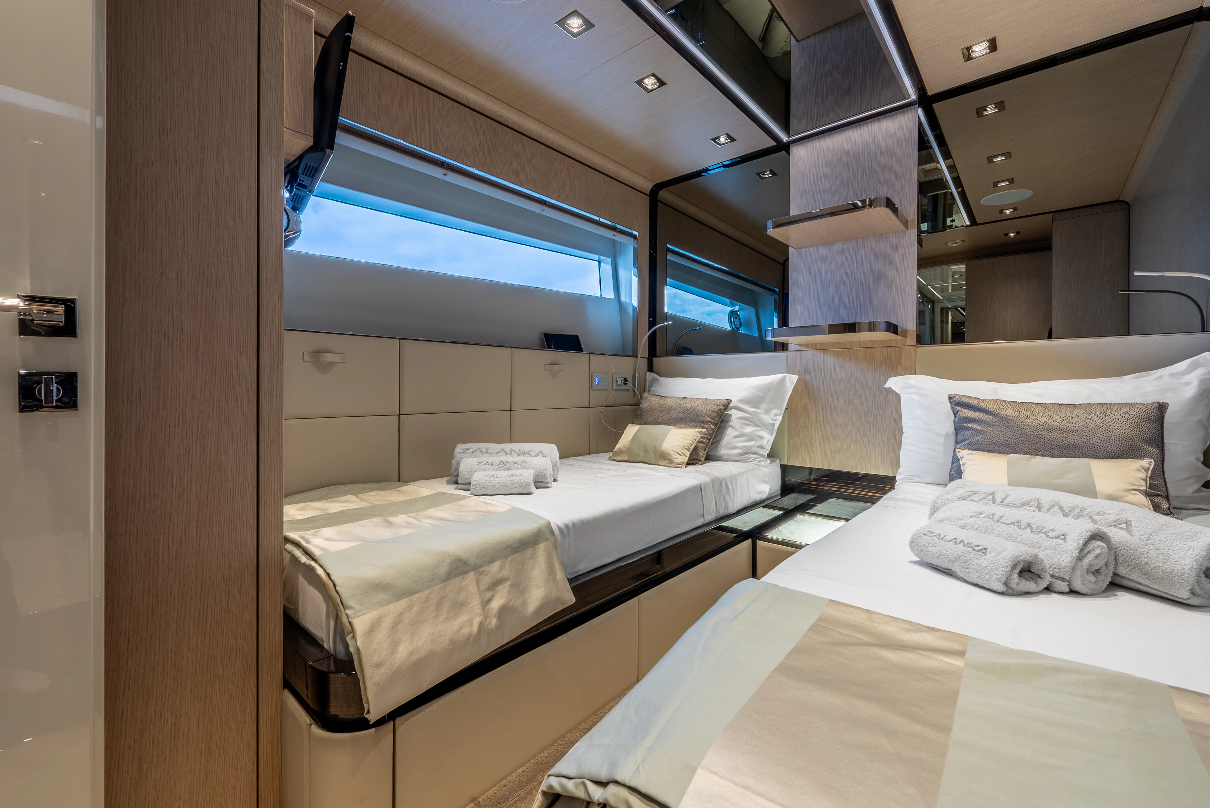 a room with beds and a window aboard ZALANKA Yacht for Sale
