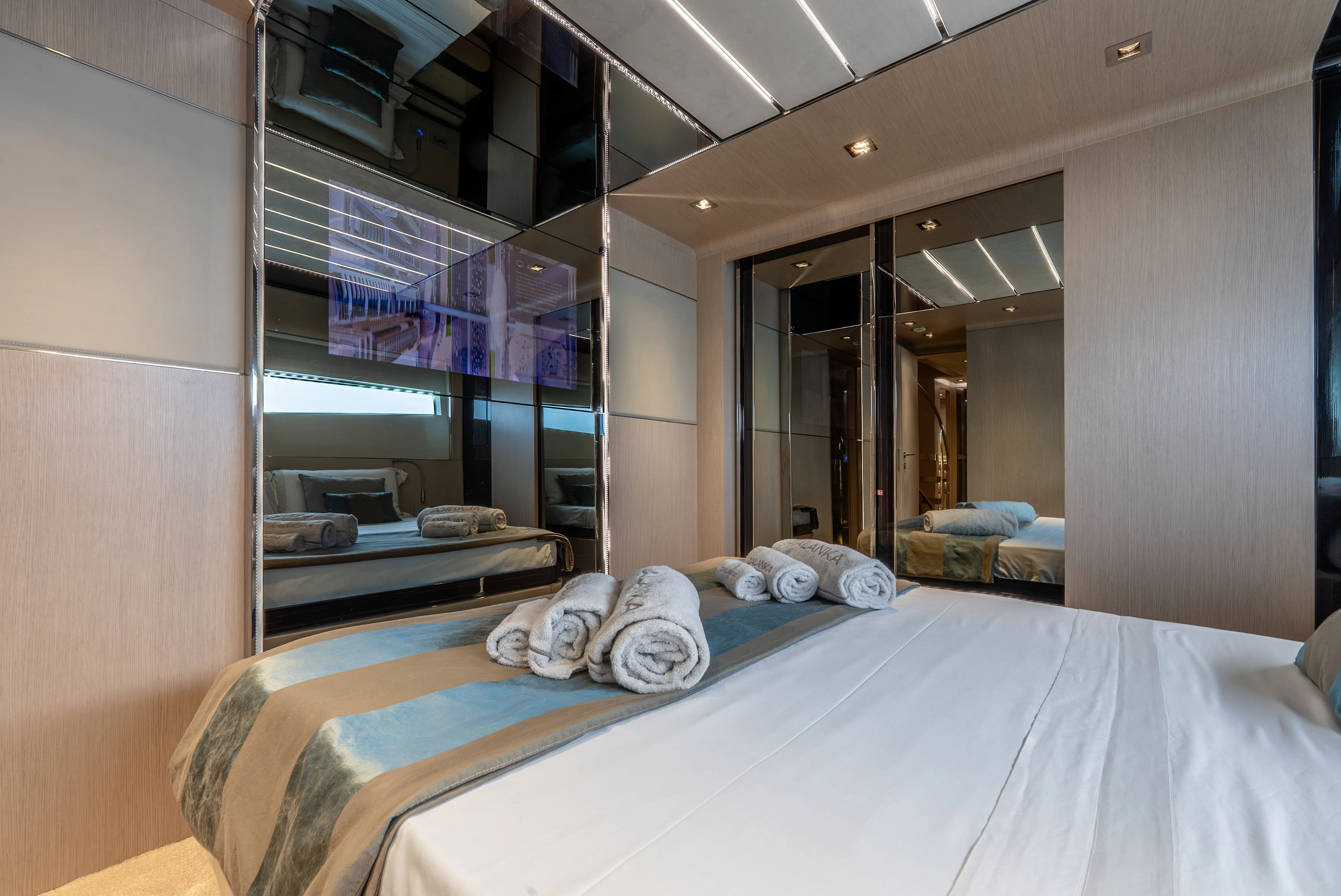 a bed with a white sheet aboard ZALANKA Yacht for Sale