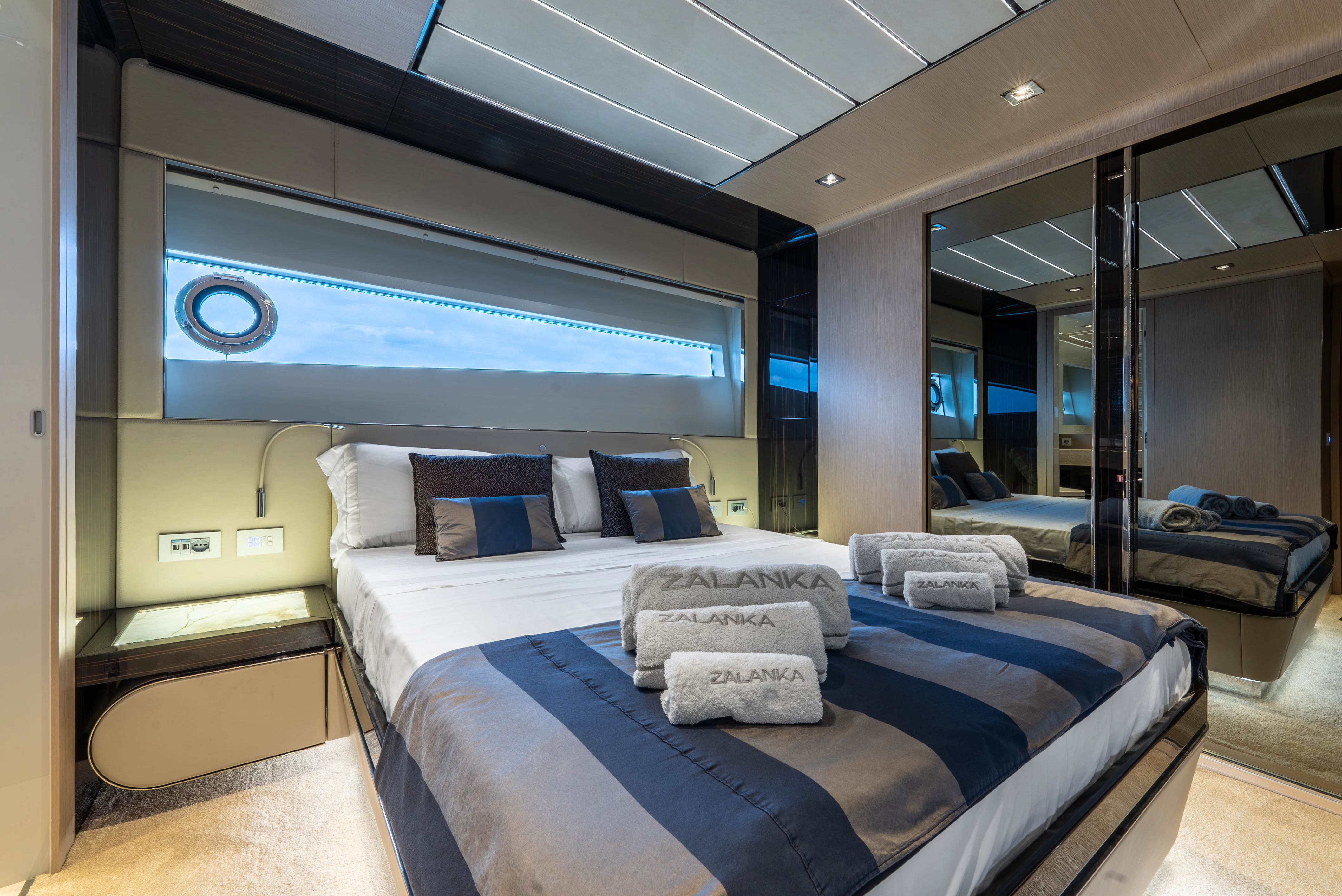 a room with a bed and a couch aboard ZALANKA Yacht for Sale