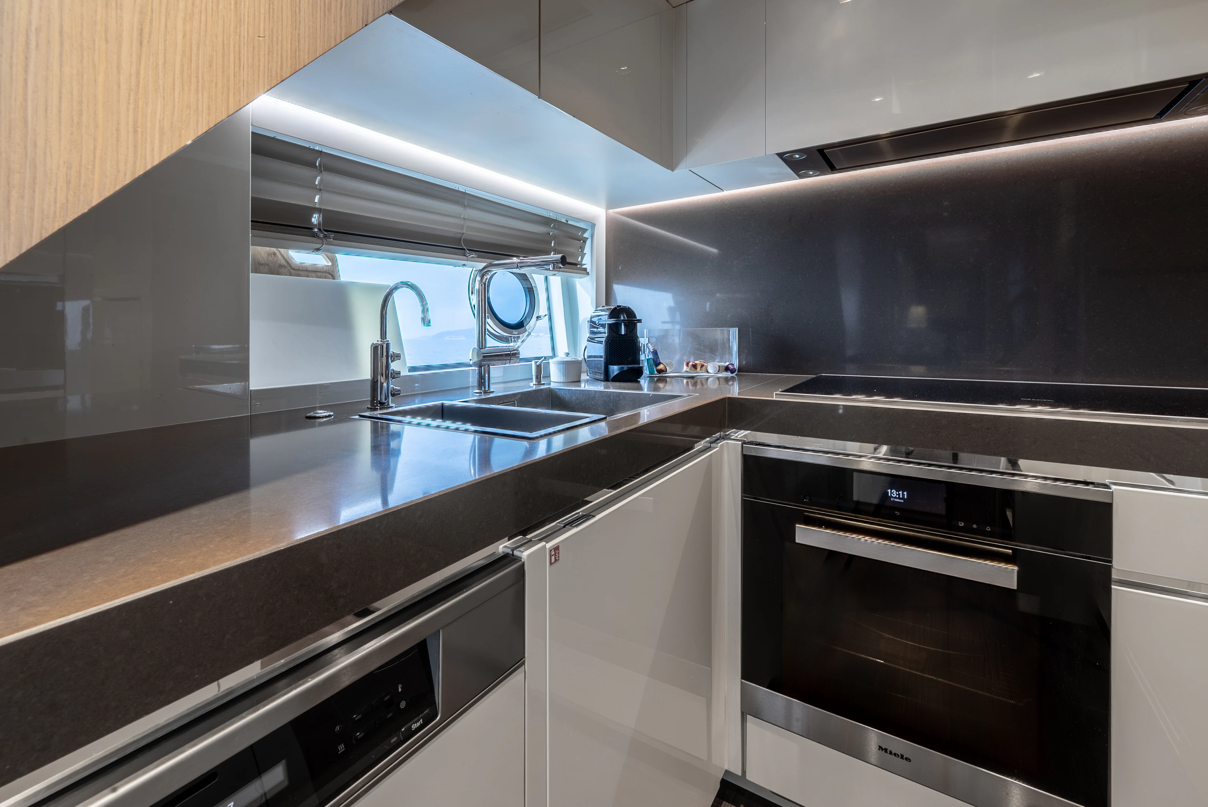 a kitchen with a stove and a sink aboard ZALANKA Yacht for Sale