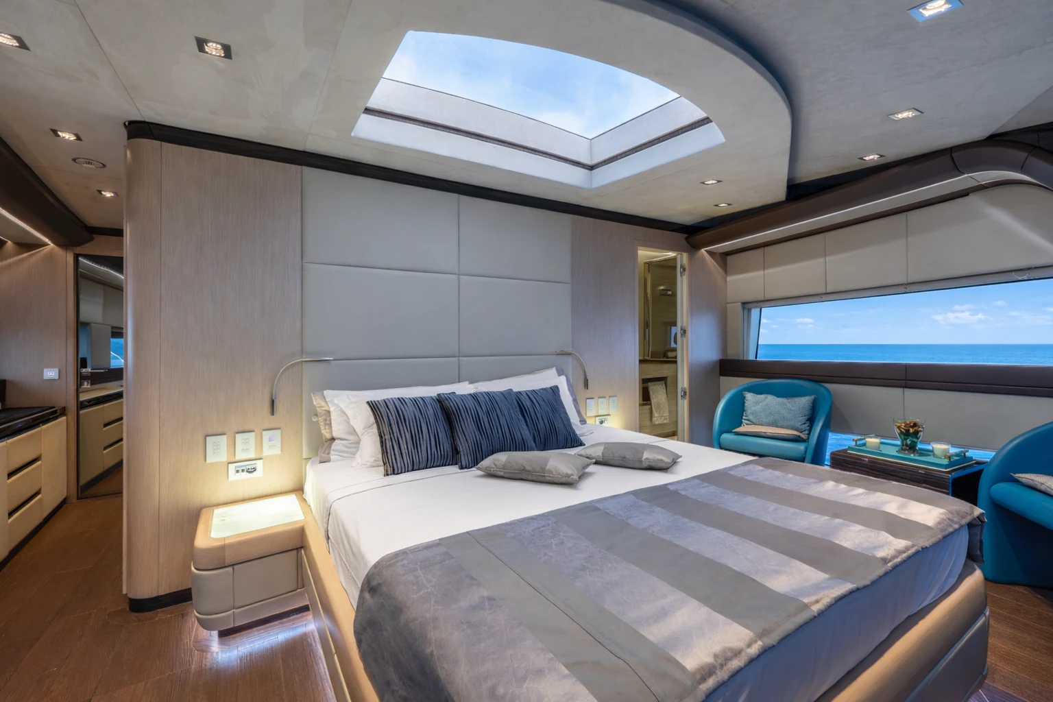a room with a bed and a chair aboard ZALANKA Yacht for Sale