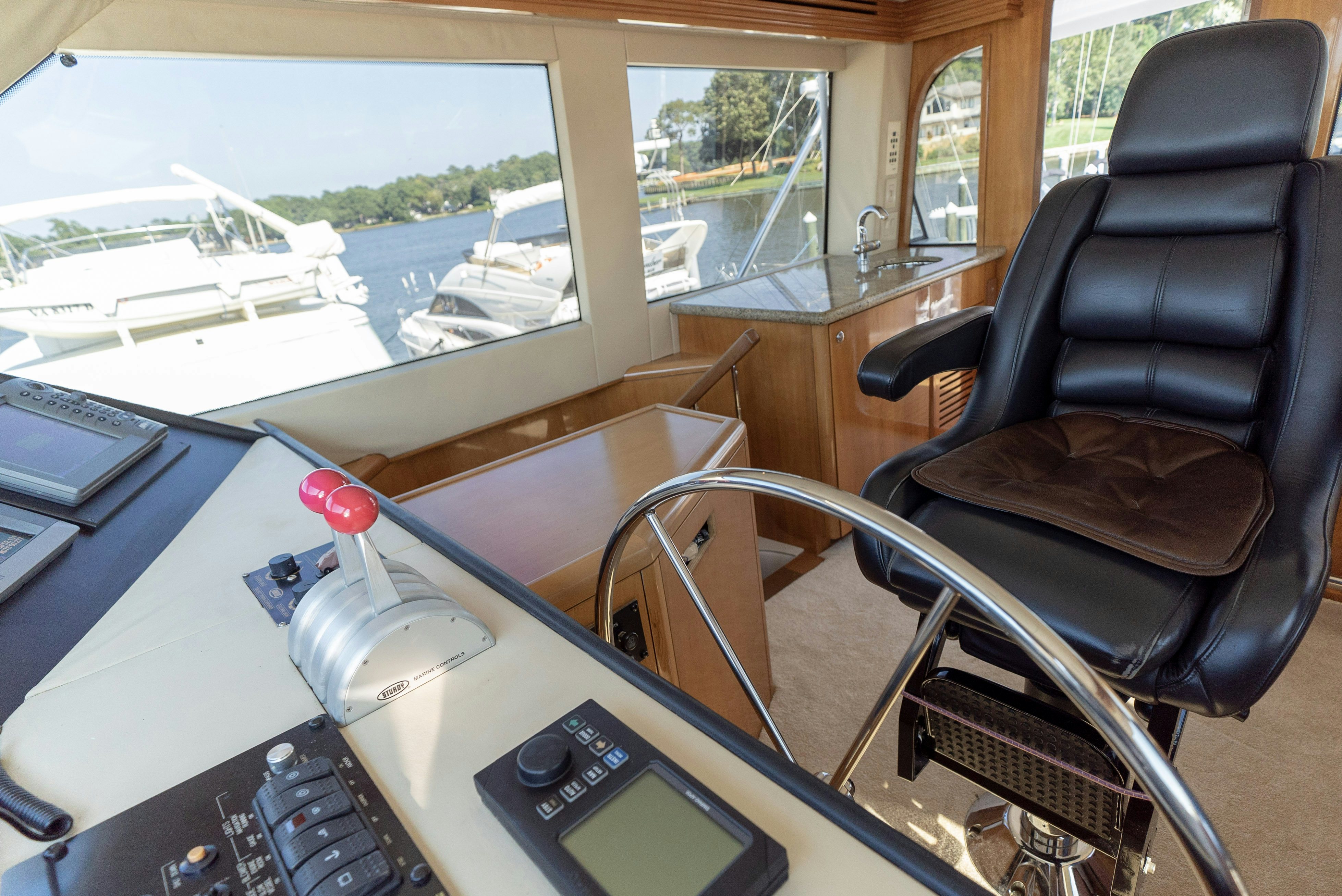 a desk with a computer and a chair aboard SONORA Yacht for Sale