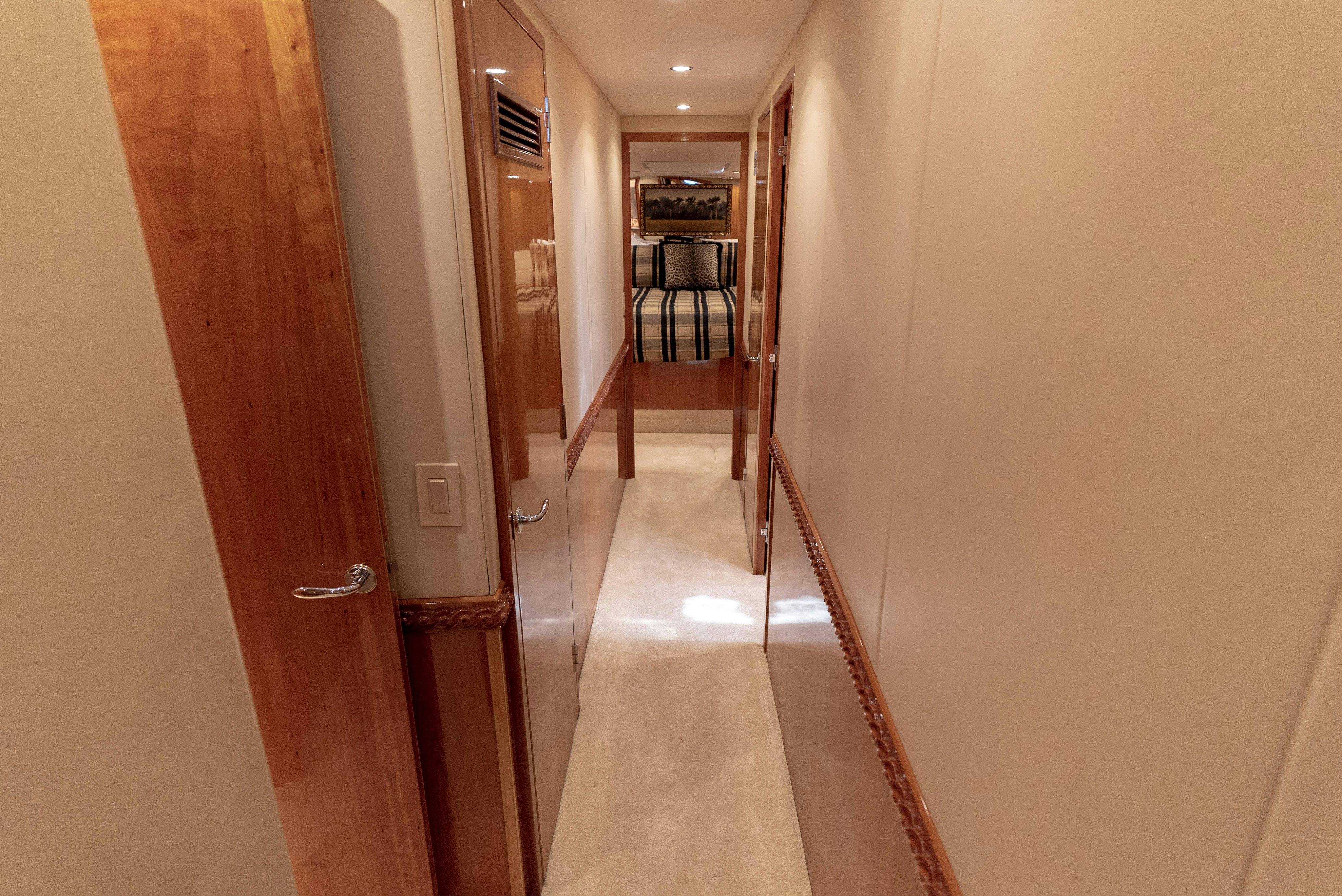 a hallway with a door and a hallway with a door aboard SONORA Yacht for Sale