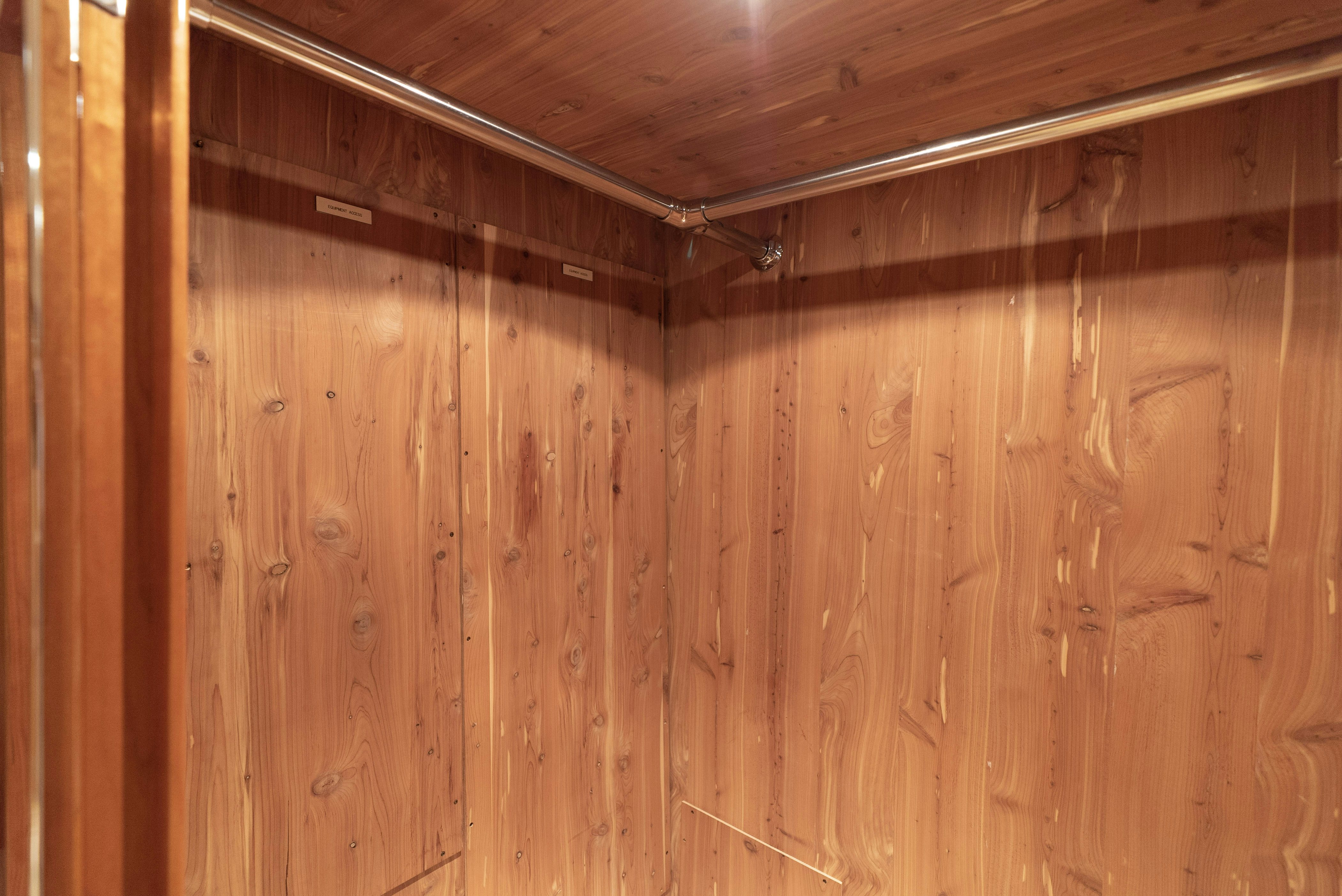 a wooden wall with a light aboard SONORA Yacht for Sale
