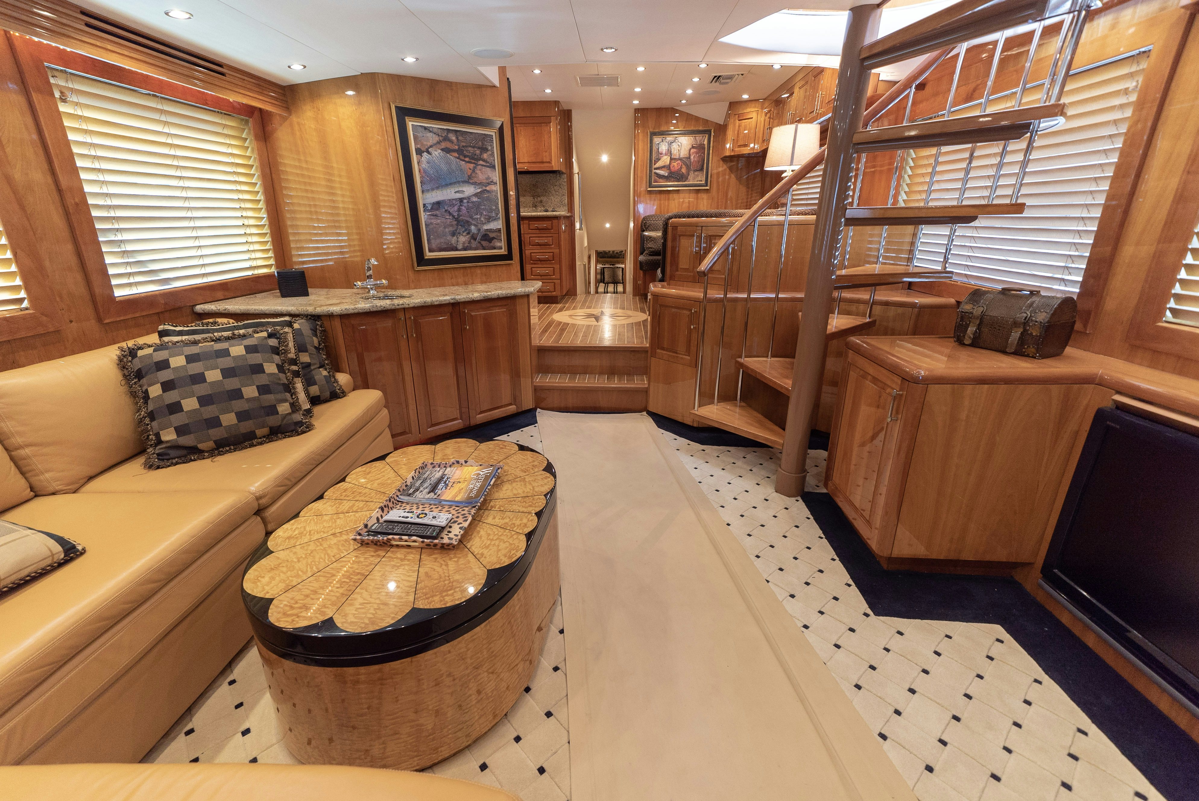 a large room with wooden floors aboard SONORA Yacht for Sale