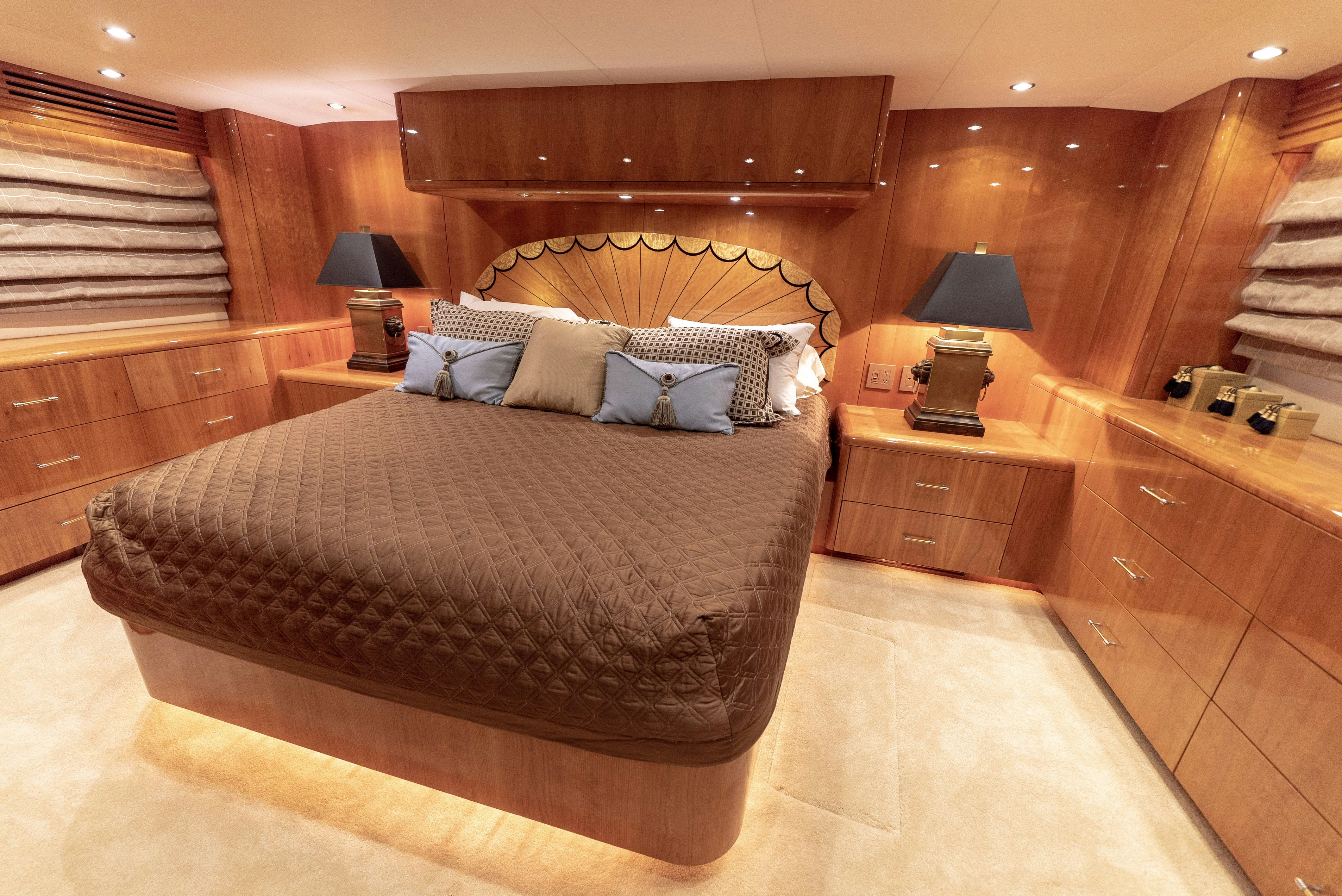 a bed in a room aboard SONORA Yacht for Sale