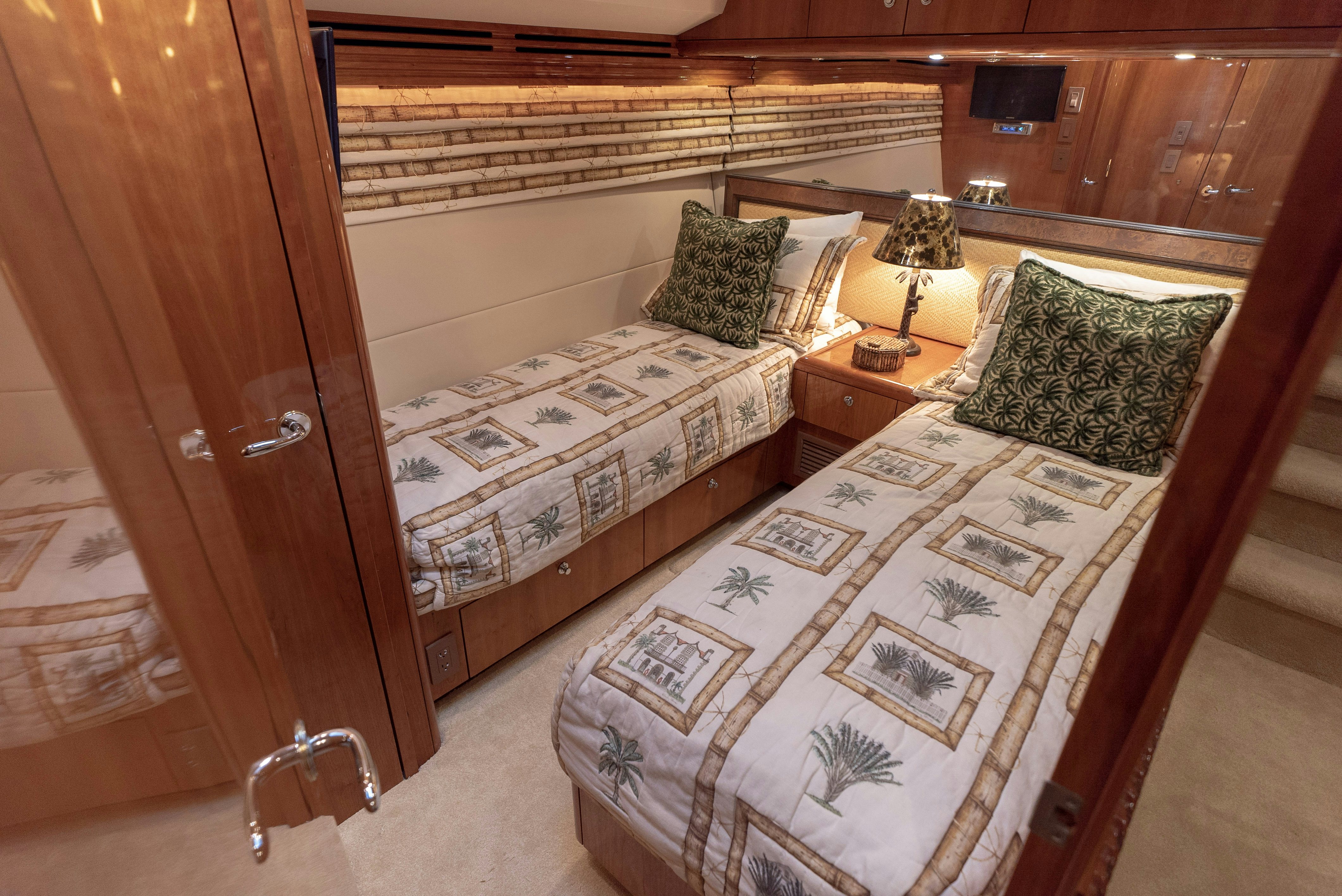 a couple of beds in a room aboard SONORA Yacht for Sale