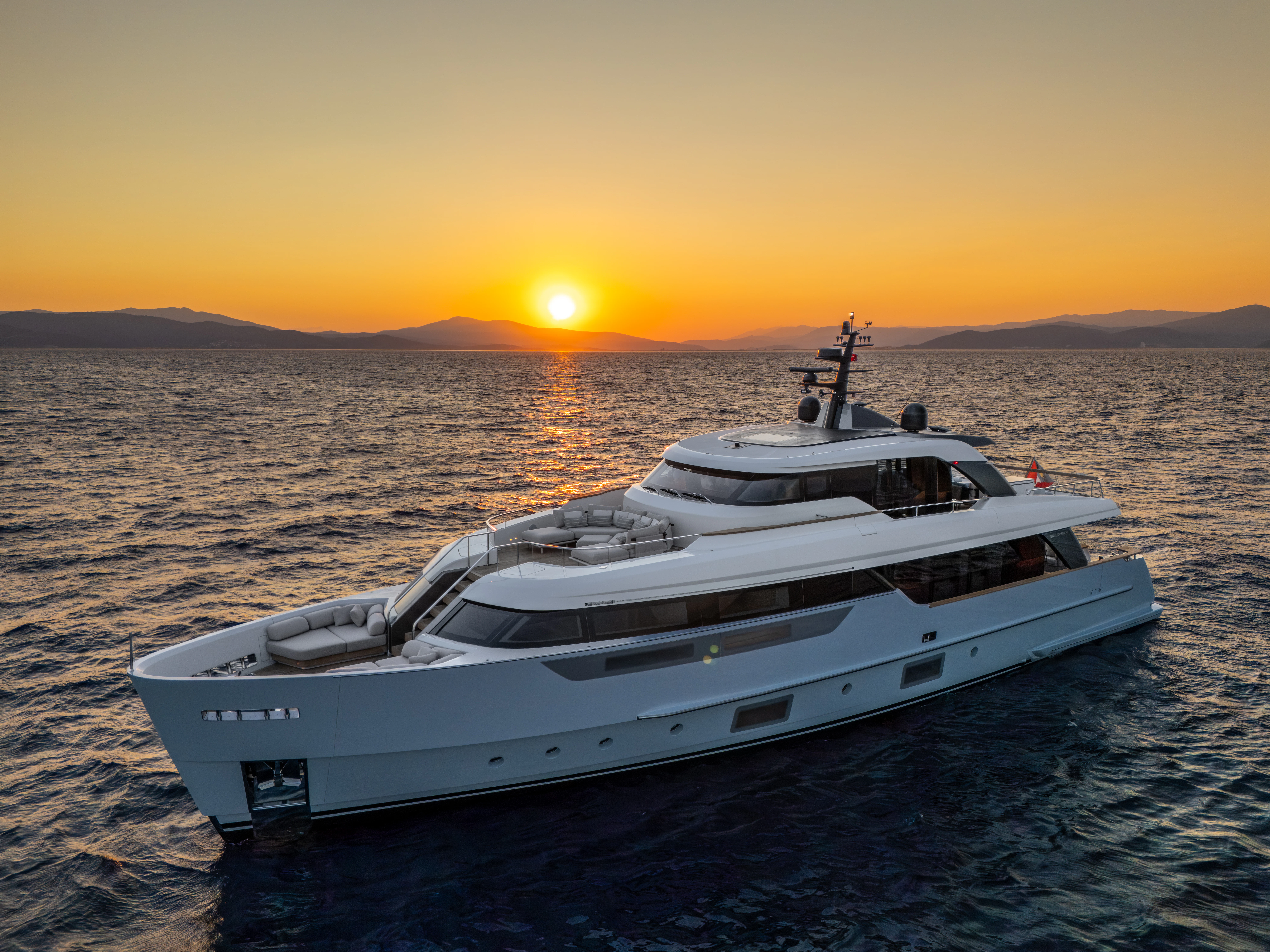 a white yacht on the water aboard AISHA Yacht for Sale