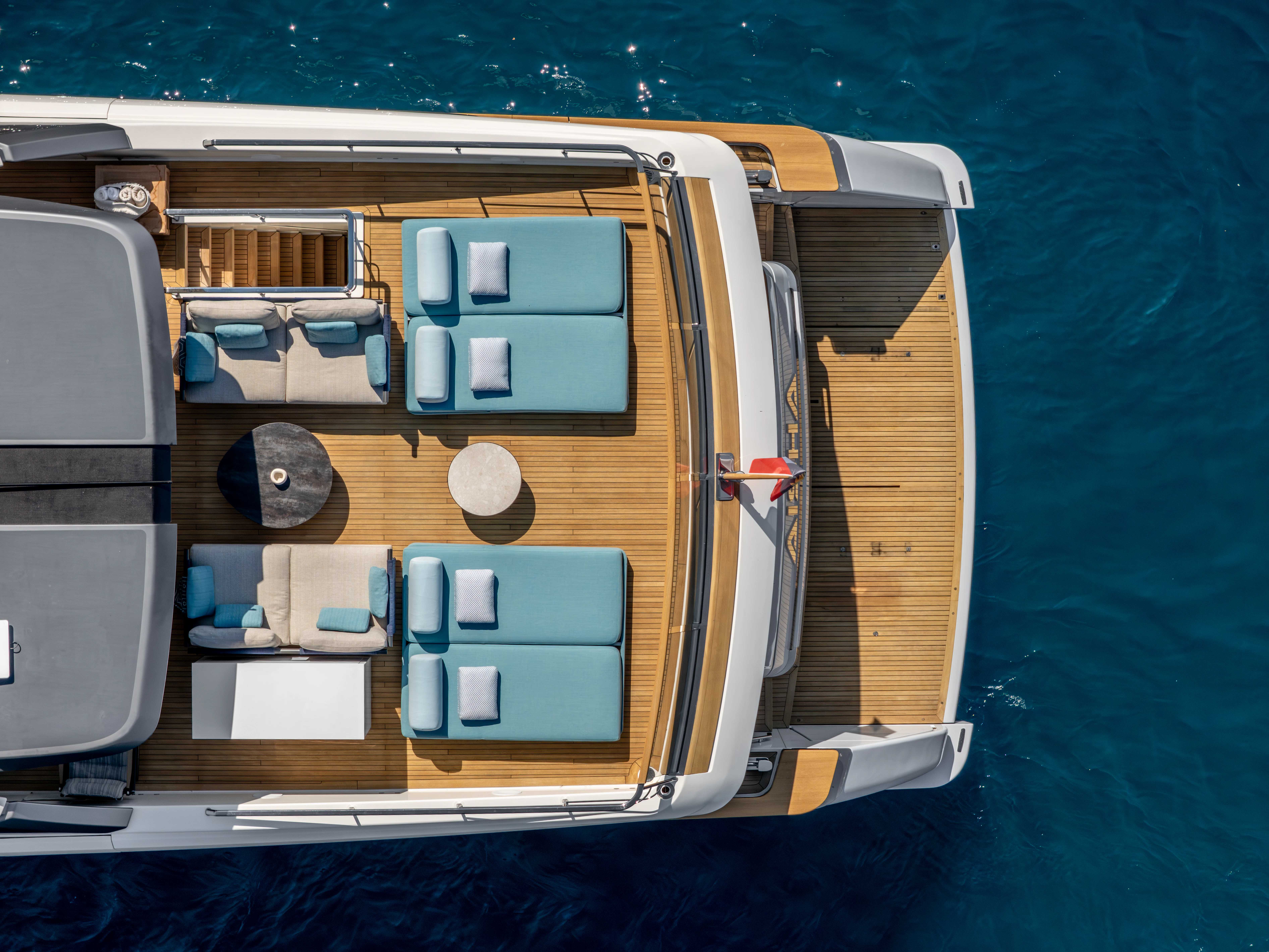 a boat with a deck and a deck aboard AISHA Yacht for Sale