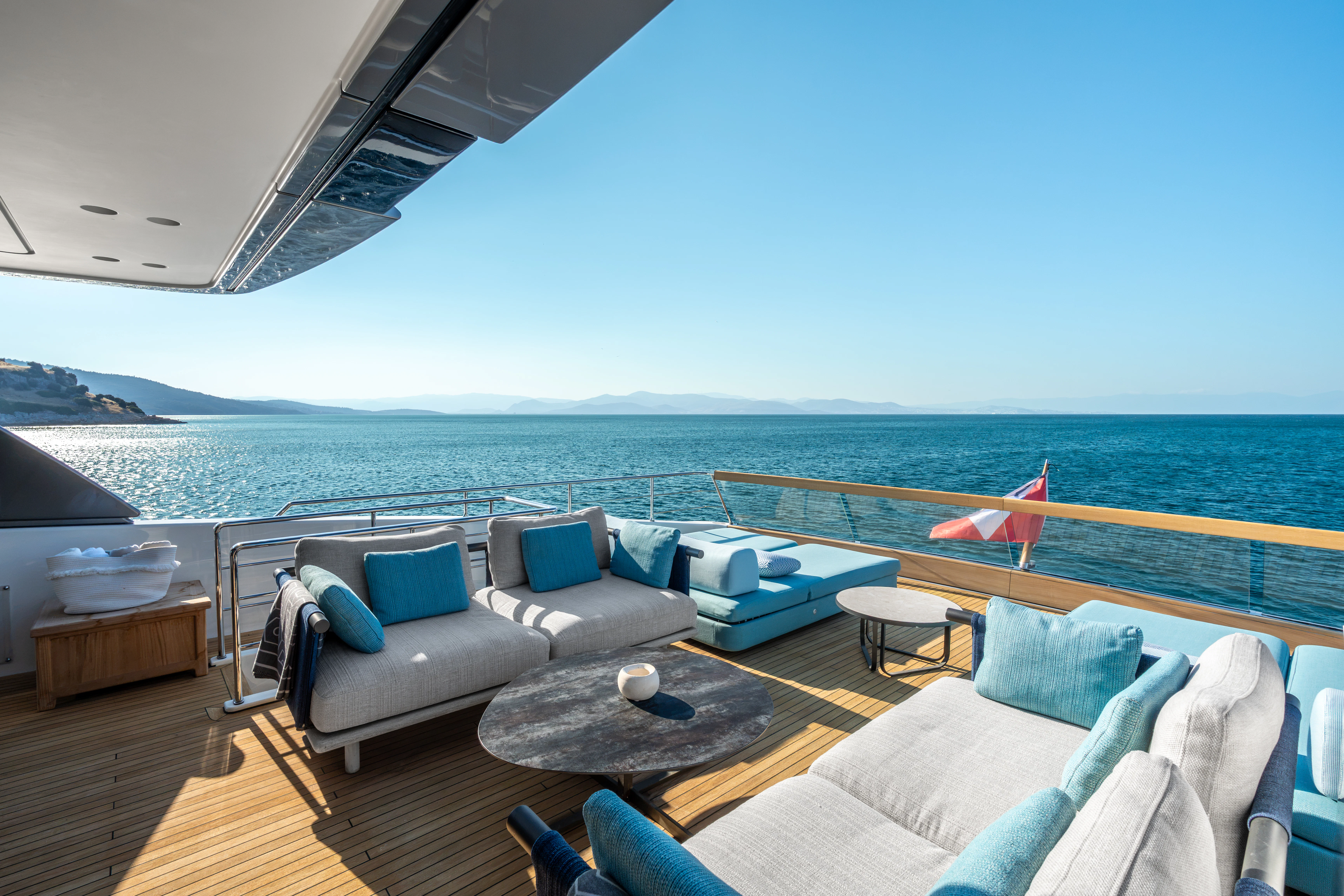 a large living room with a large body of water aboard AISHA Yacht for Sale