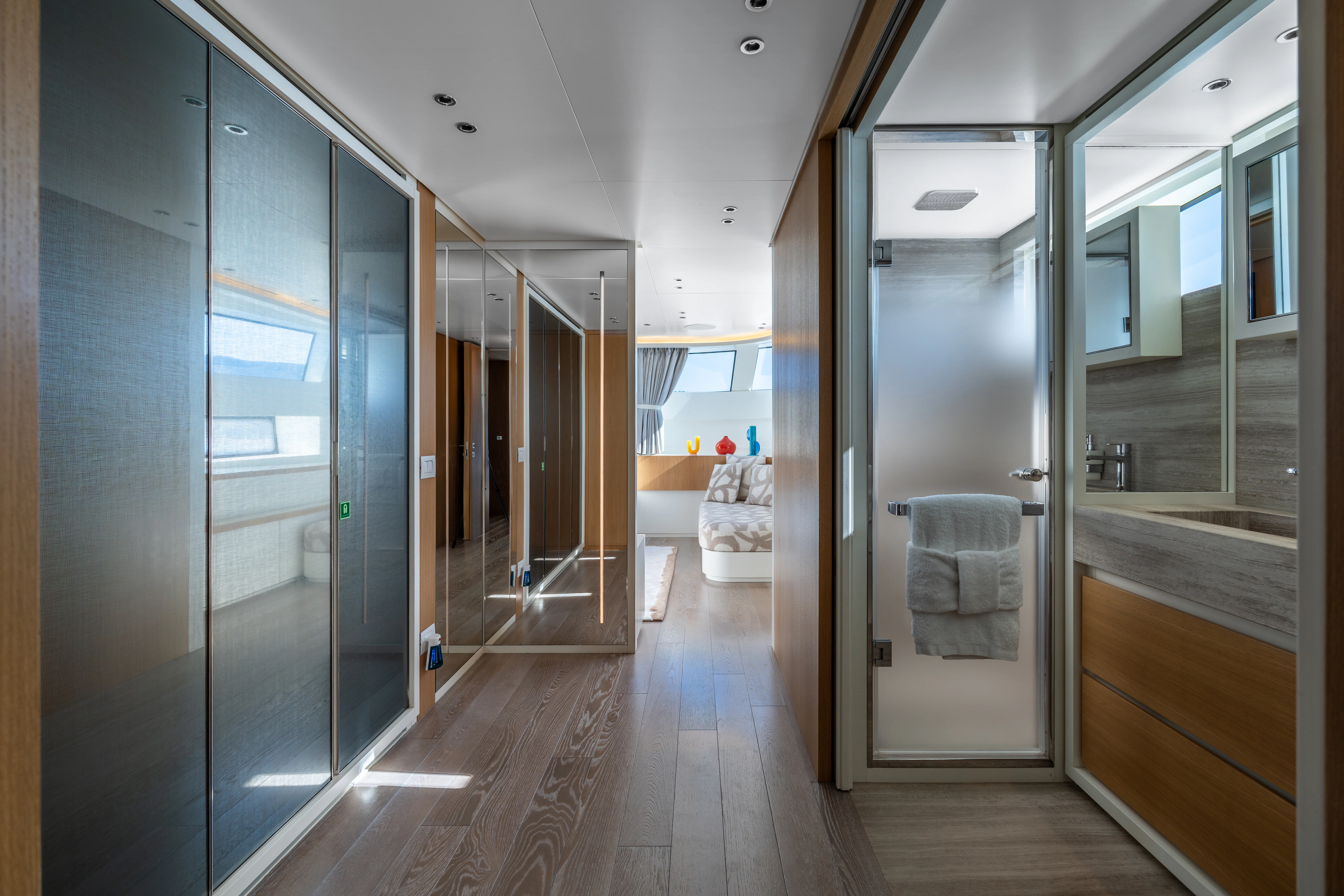 a room with glass doors aboard AISHA Yacht for Sale