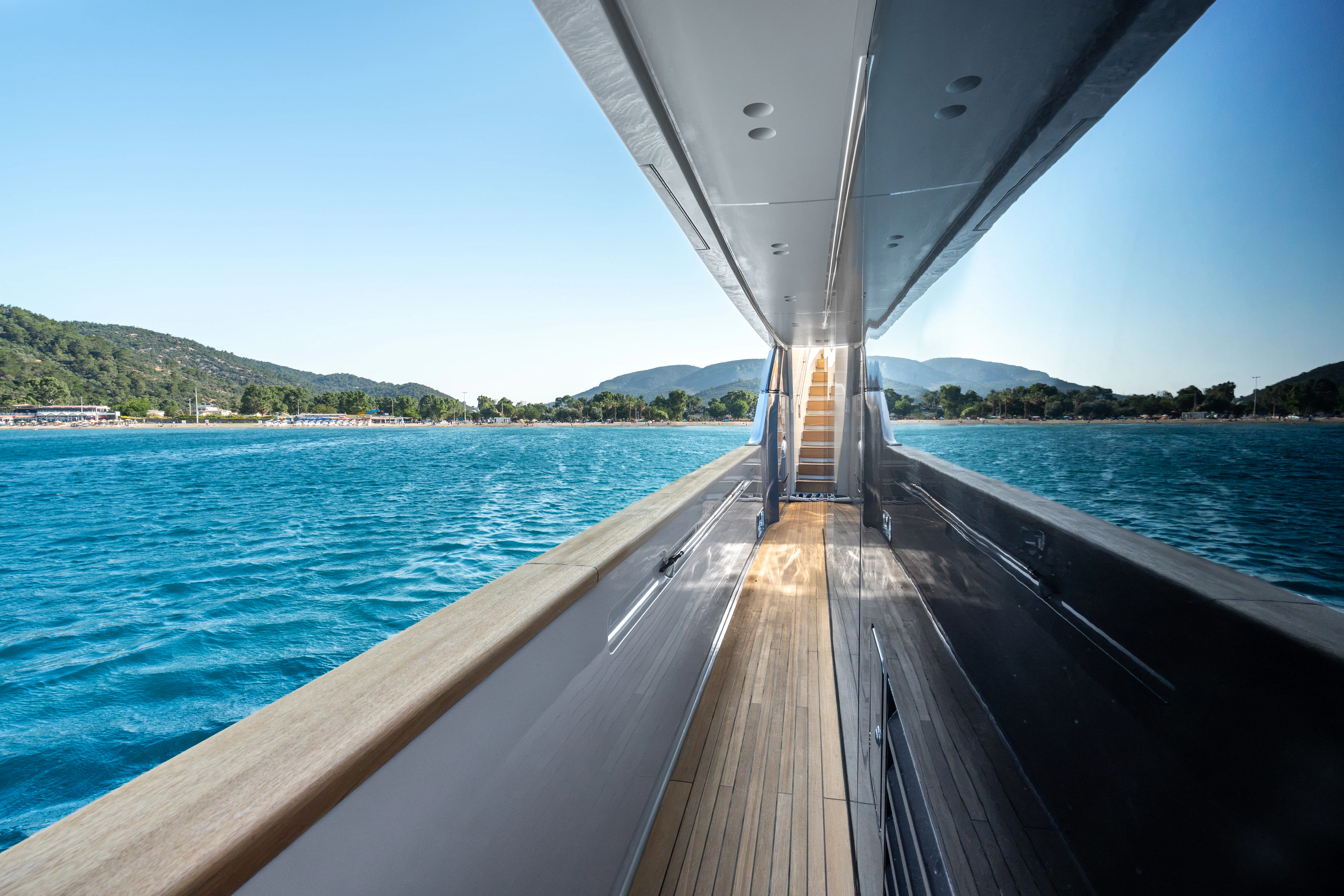 a wooden dock over a body of water aboard AISHA Yacht for Sale