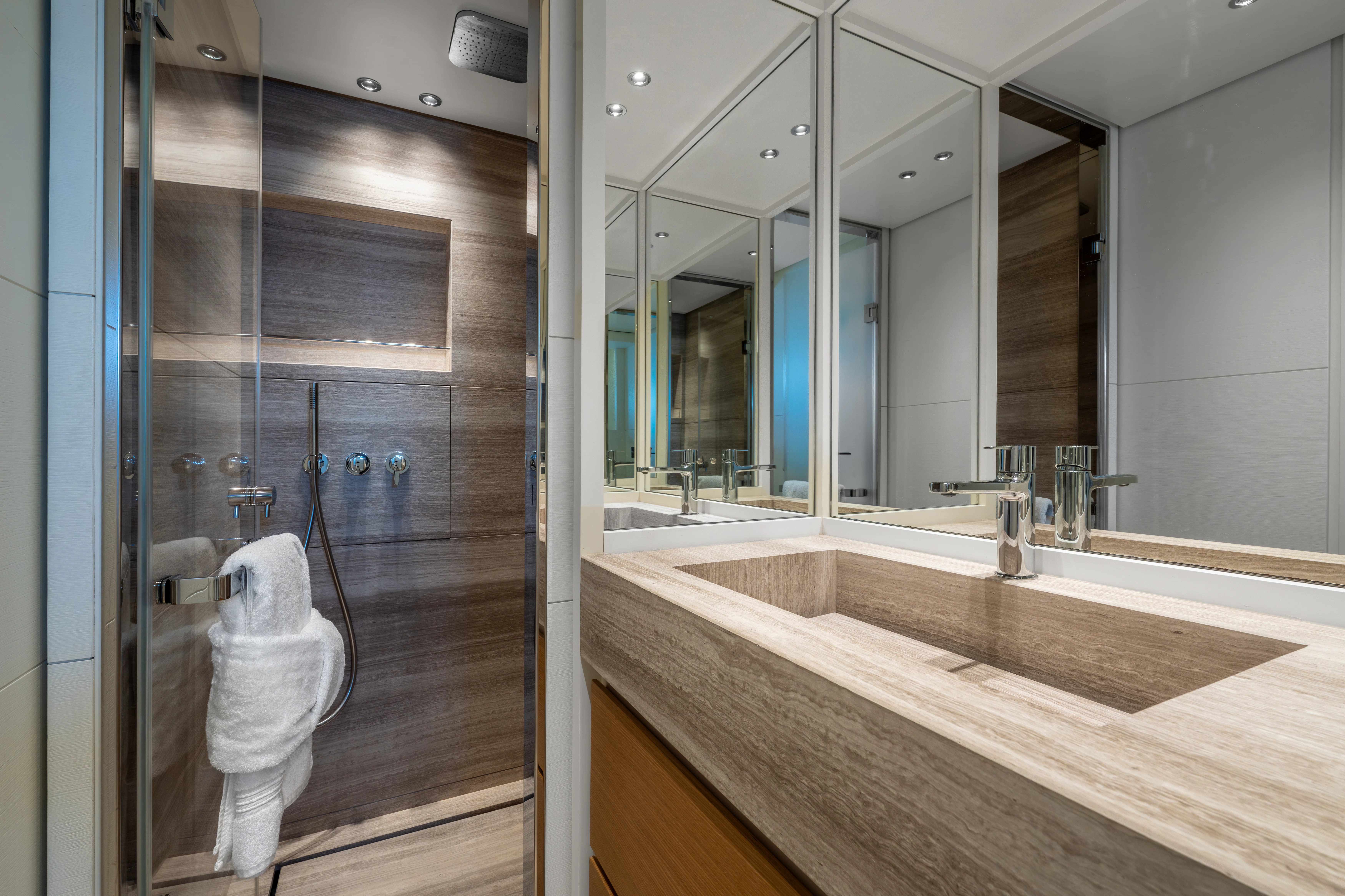 a bathroom with a large mirror aboard AISHA Yacht for Sale