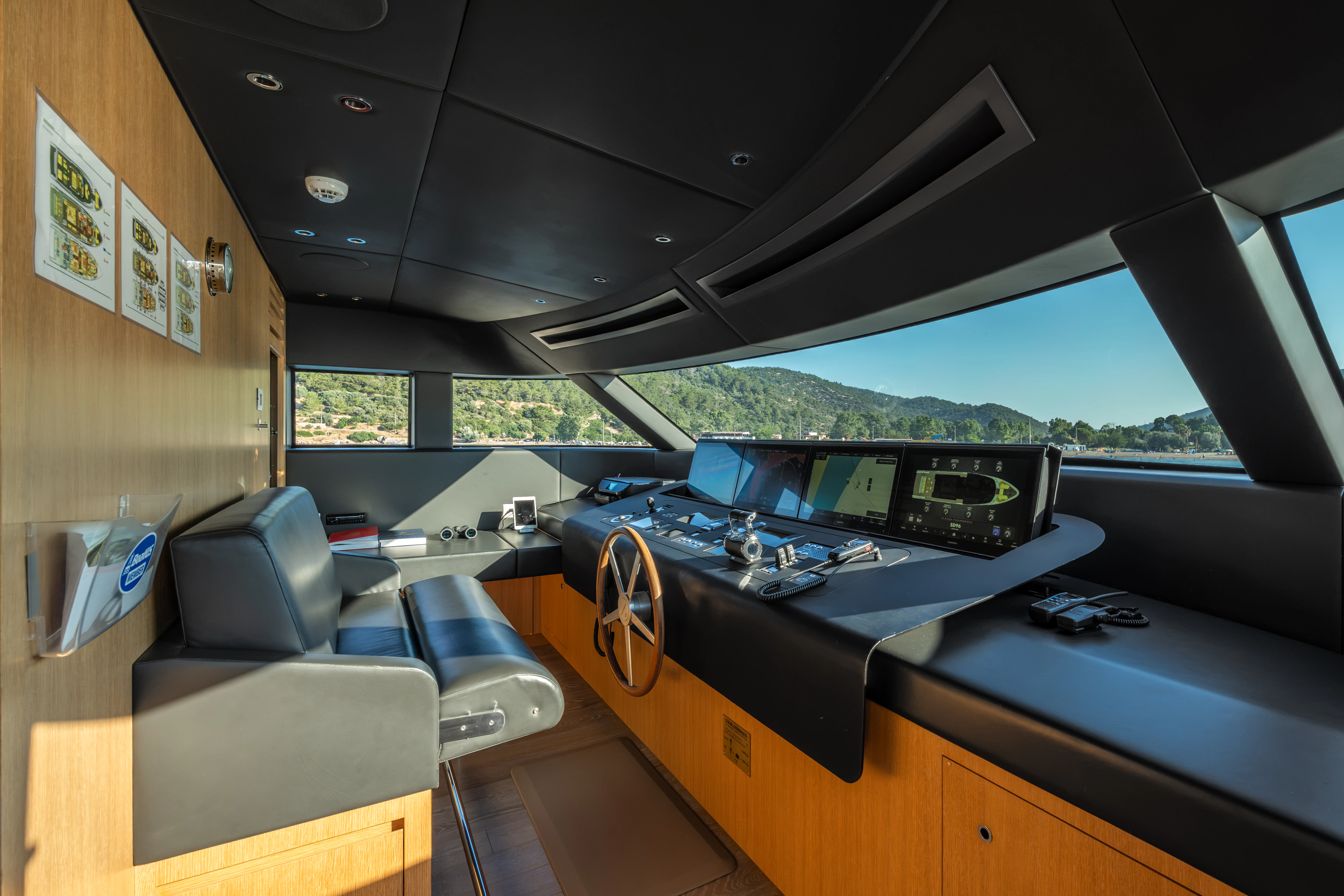 a room with a desk and computers aboard AISHA Yacht for Sale