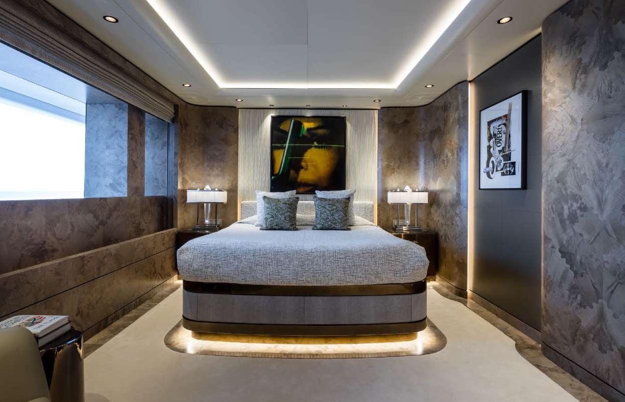 a bed in a room aboard O'PARI Yacht for Charter