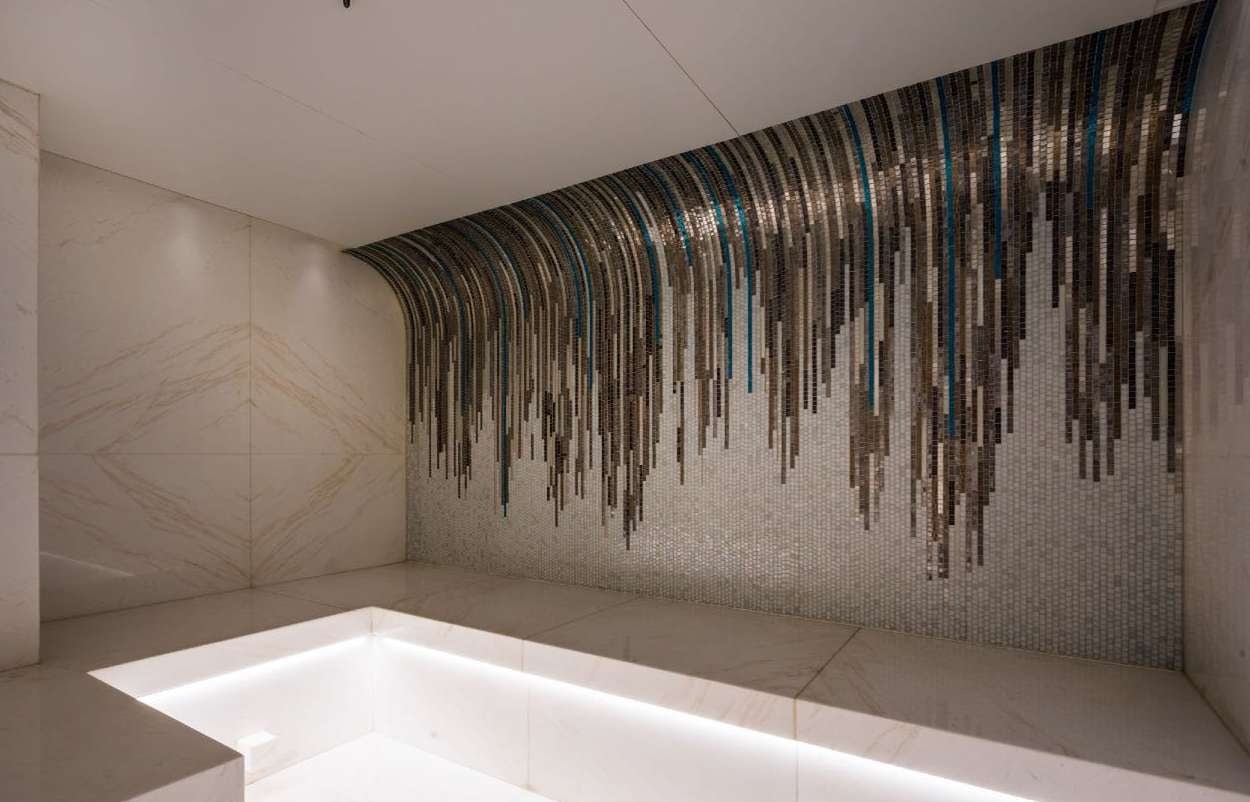 a shower curtain with blue and white stripes aboard O'PARI Yacht for Charter