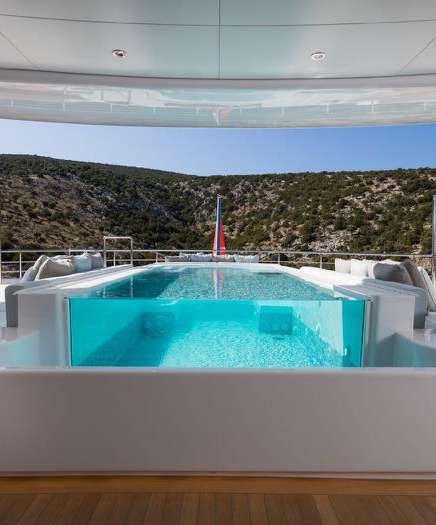 a swimming pool in a room aboard O'PARI Yacht for Charter