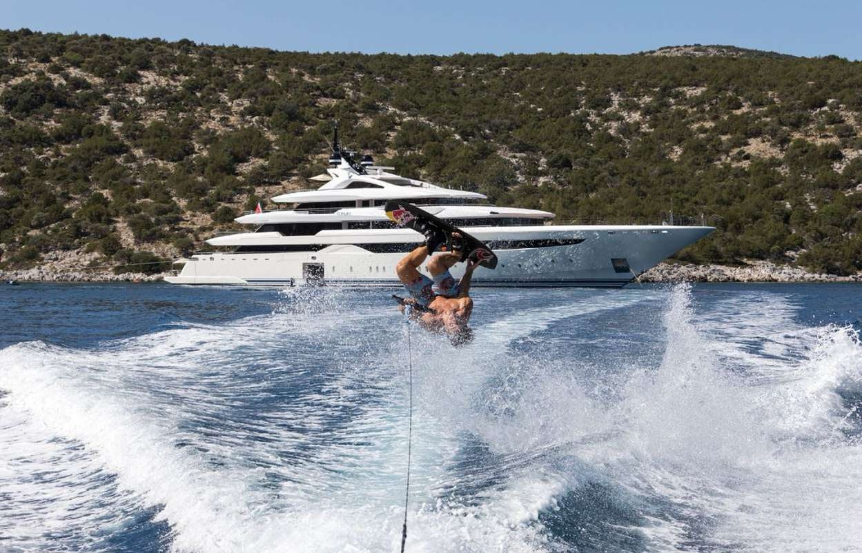 a man jumping out of a plane aboard O'PARI Yacht for Charter