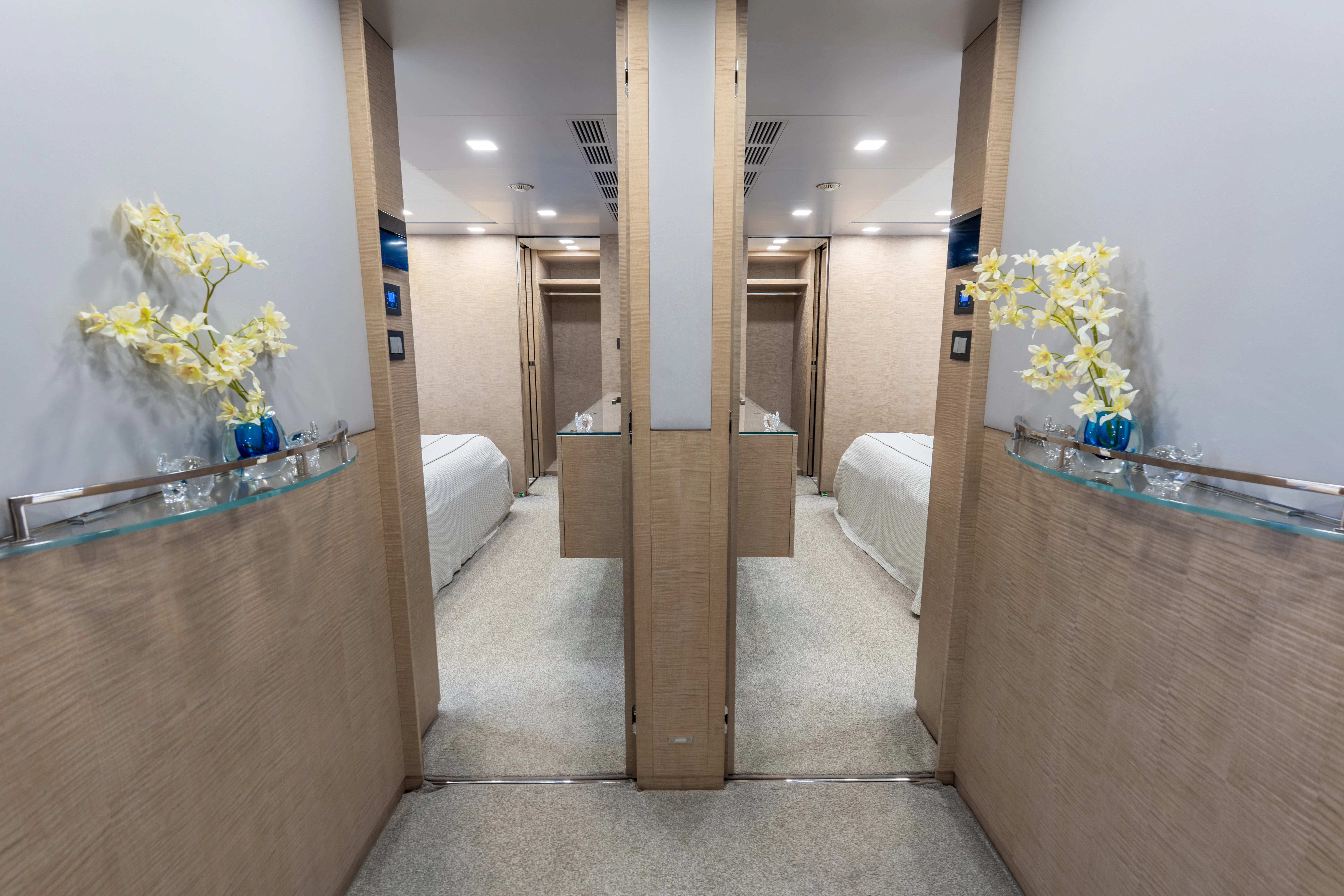 a hallway with a glass door aboard 'H Yacht for Charter