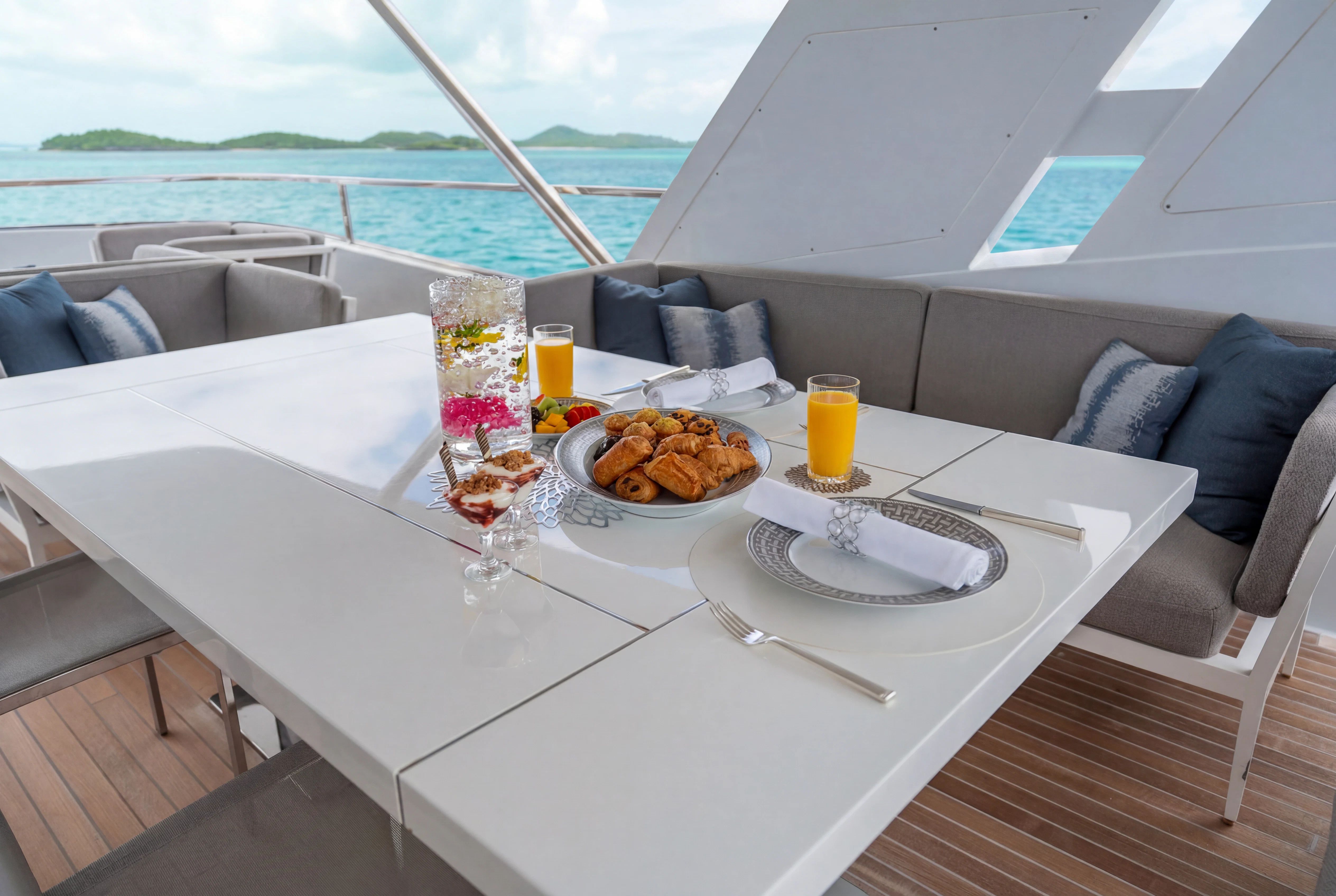 a table with food on it aboard 'H Yacht for Charter