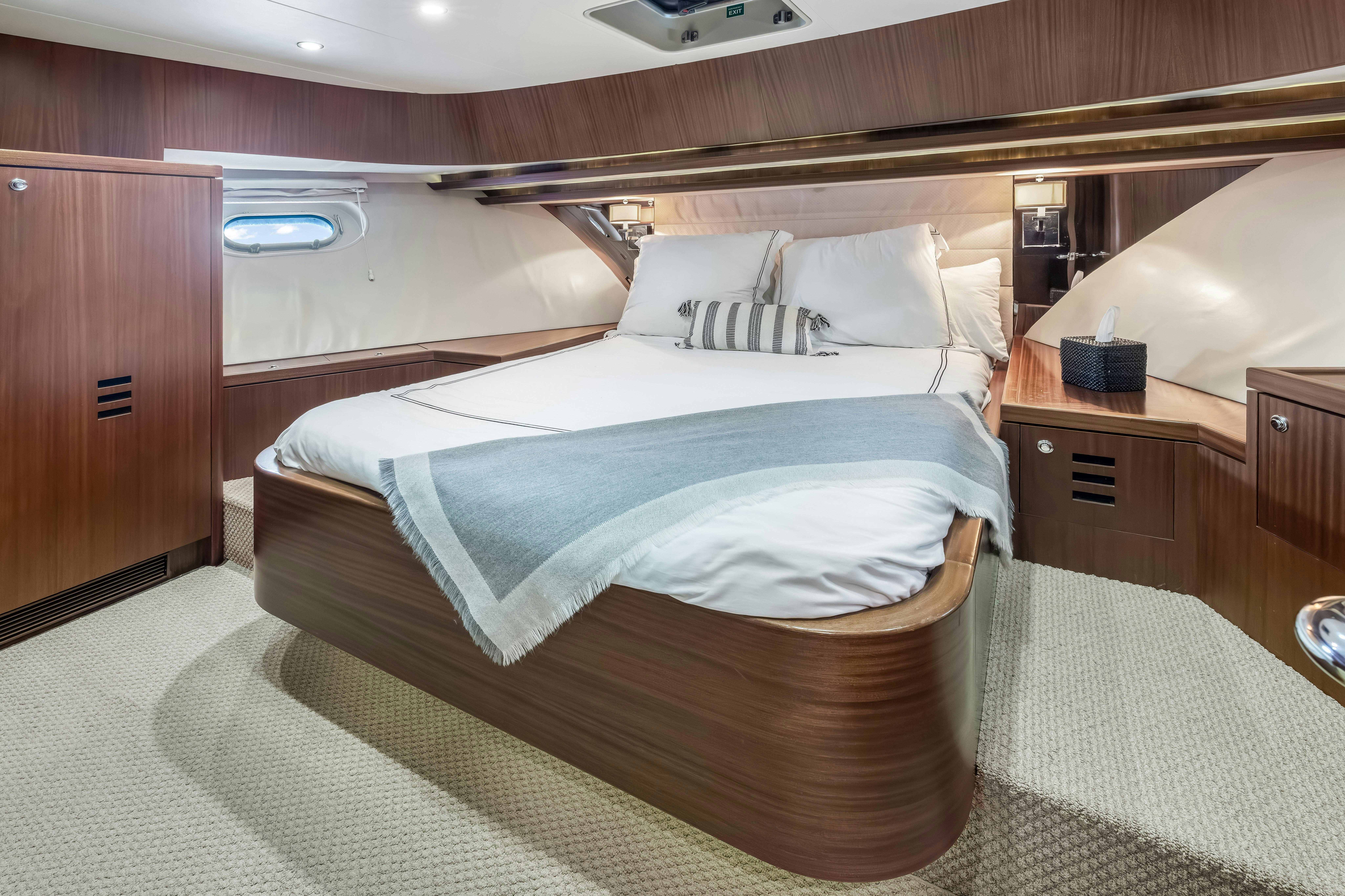 a room with two beds aboard AURORA Yacht for Sale