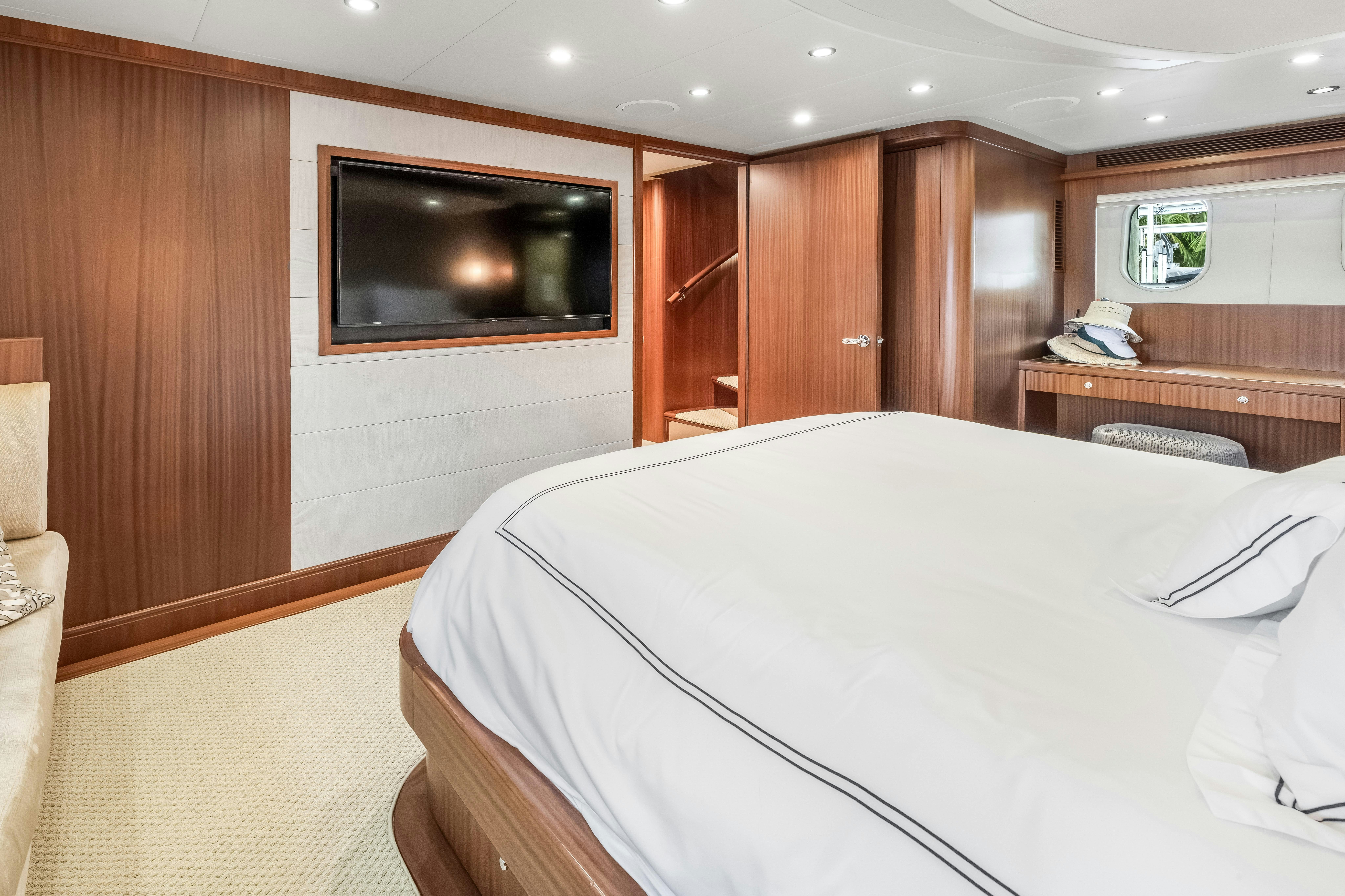 a hotel room with a tv aboard AURORA Yacht for Sale
