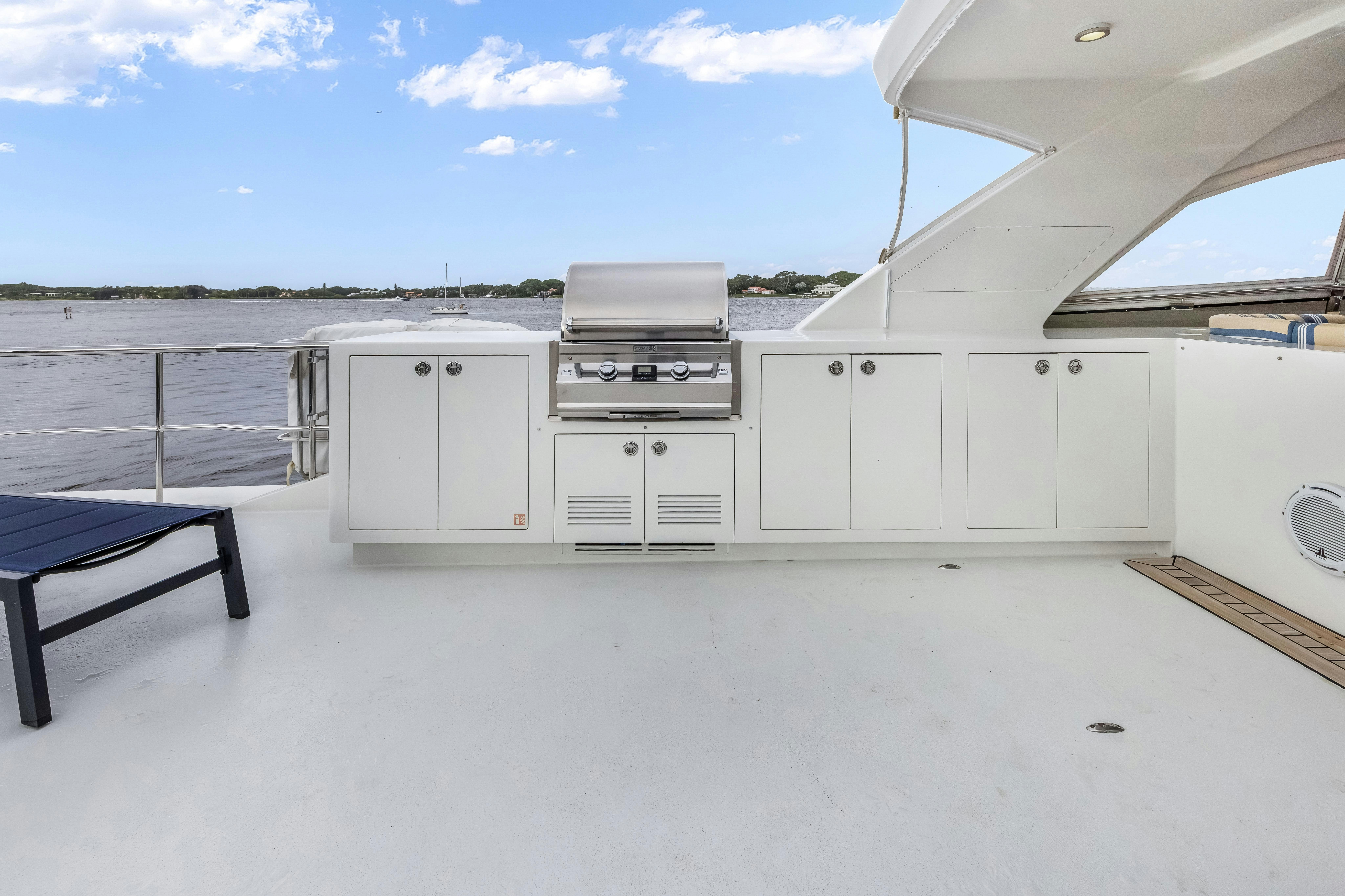 a large white kitchen aboard AURORA Yacht for Sale