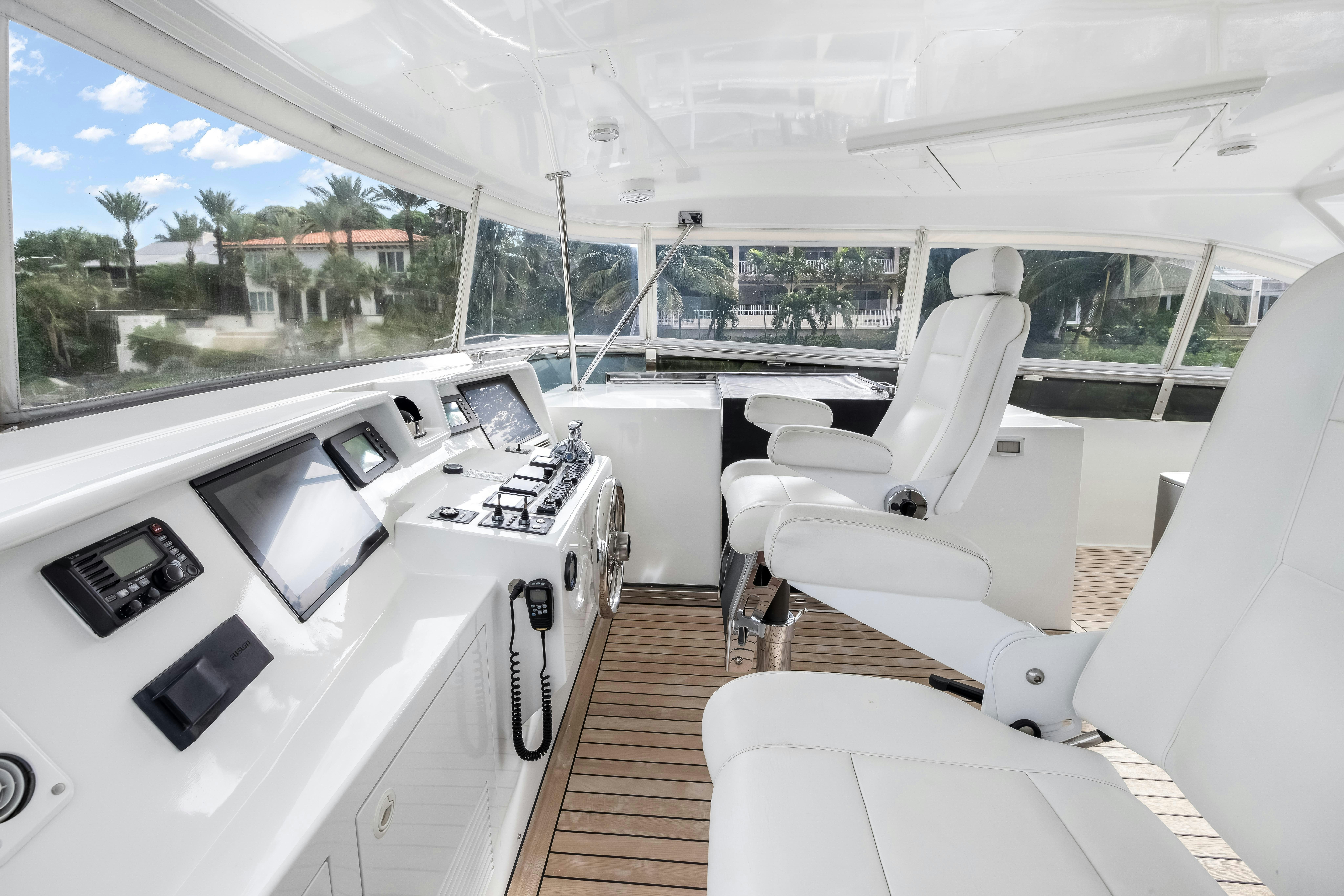 inside of a car aboard AURORA Yacht for Sale