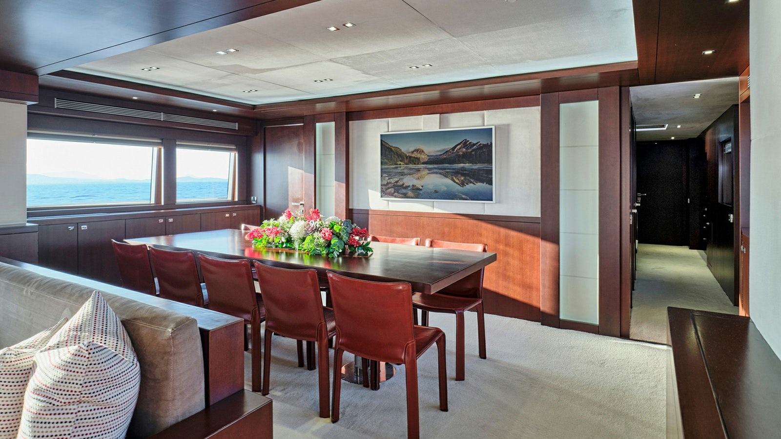 a room with a table and chairs aboard SANJANA Yacht for Charter