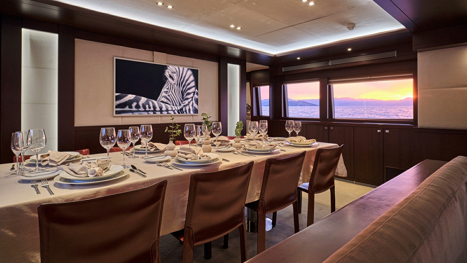 a table set for a dinner aboard SANJANA Yacht for Charter
