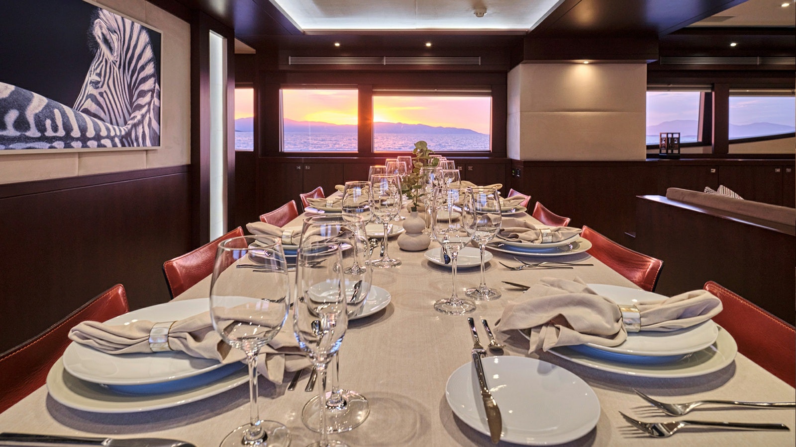a table set for a dinner aboard SANJANA Yacht for Charter