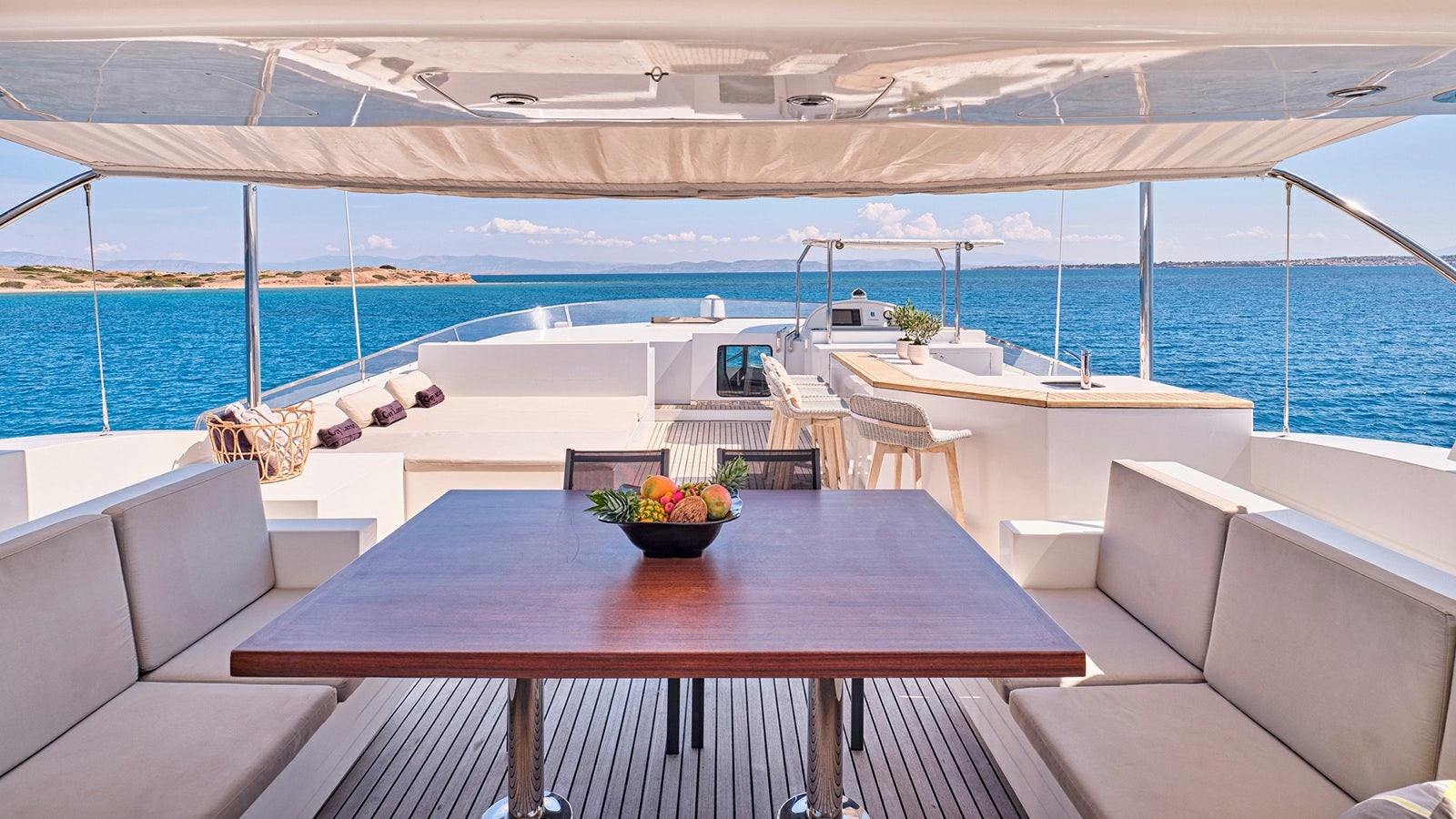 a table on a deck aboard SANJANA Yacht for Charter