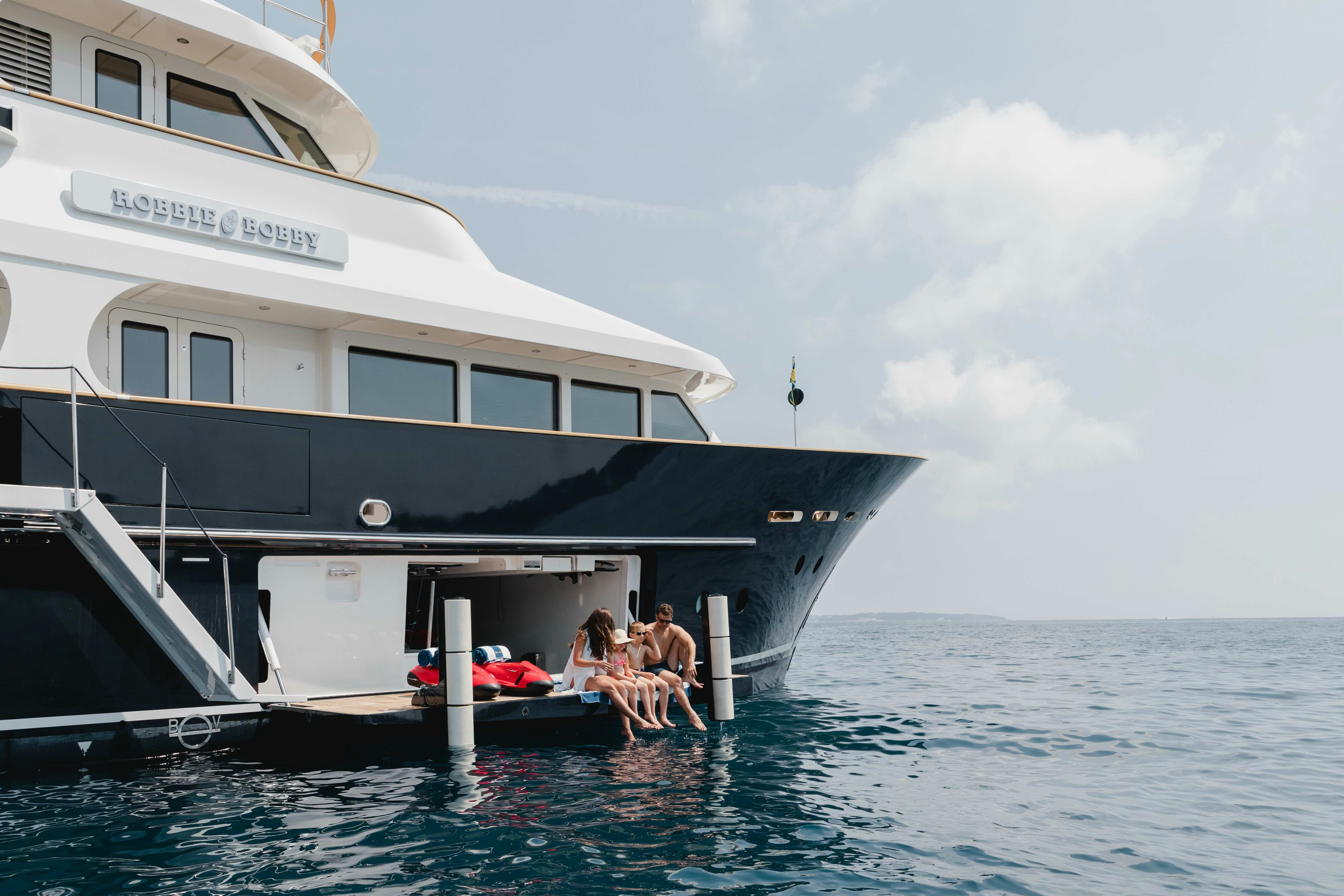 a boat with people sitting on it aboard ROBBIE BOBBY Yacht for Sale