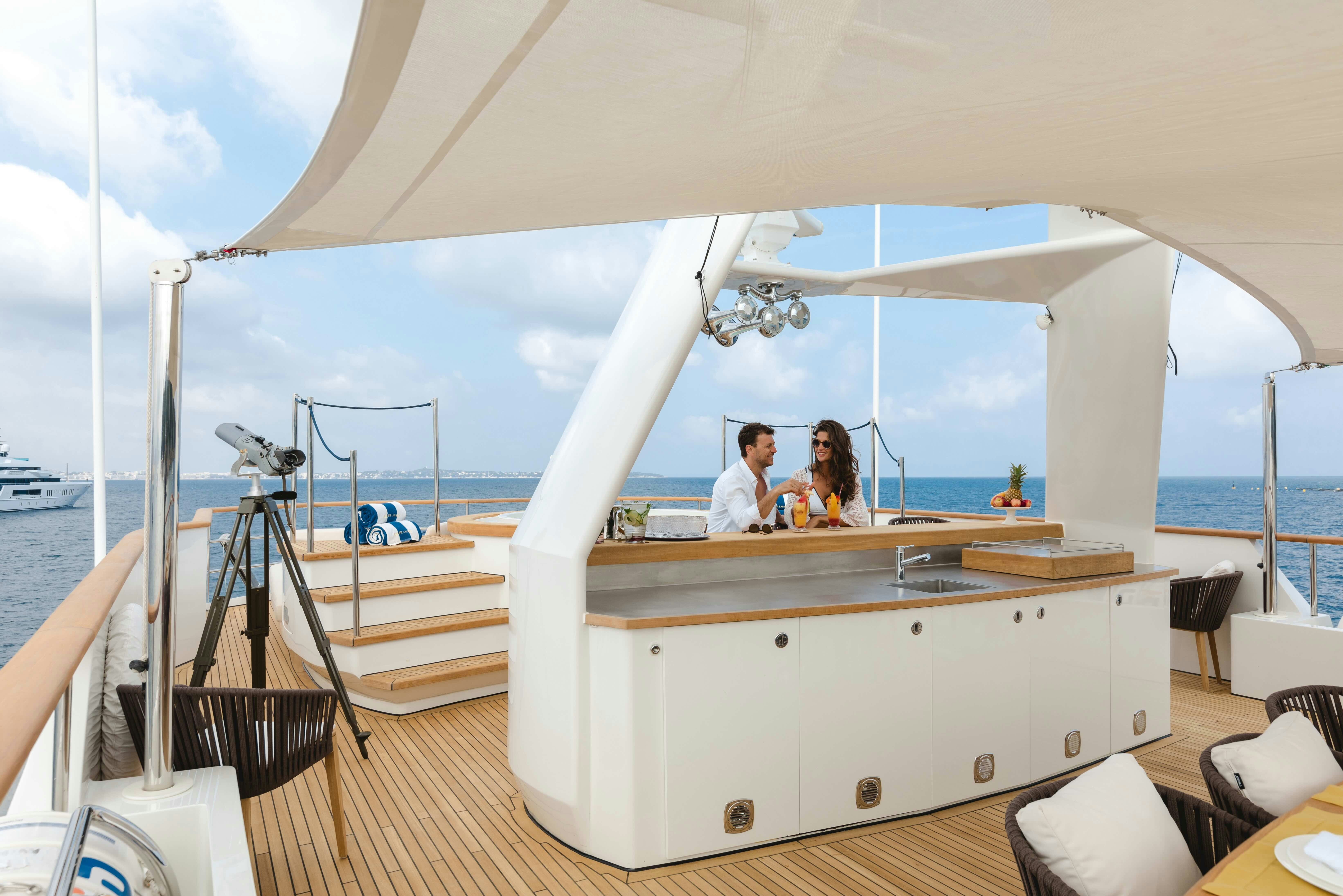 a boat with people sitting on it aboard ROBBIE BOBBY Yacht for Sale