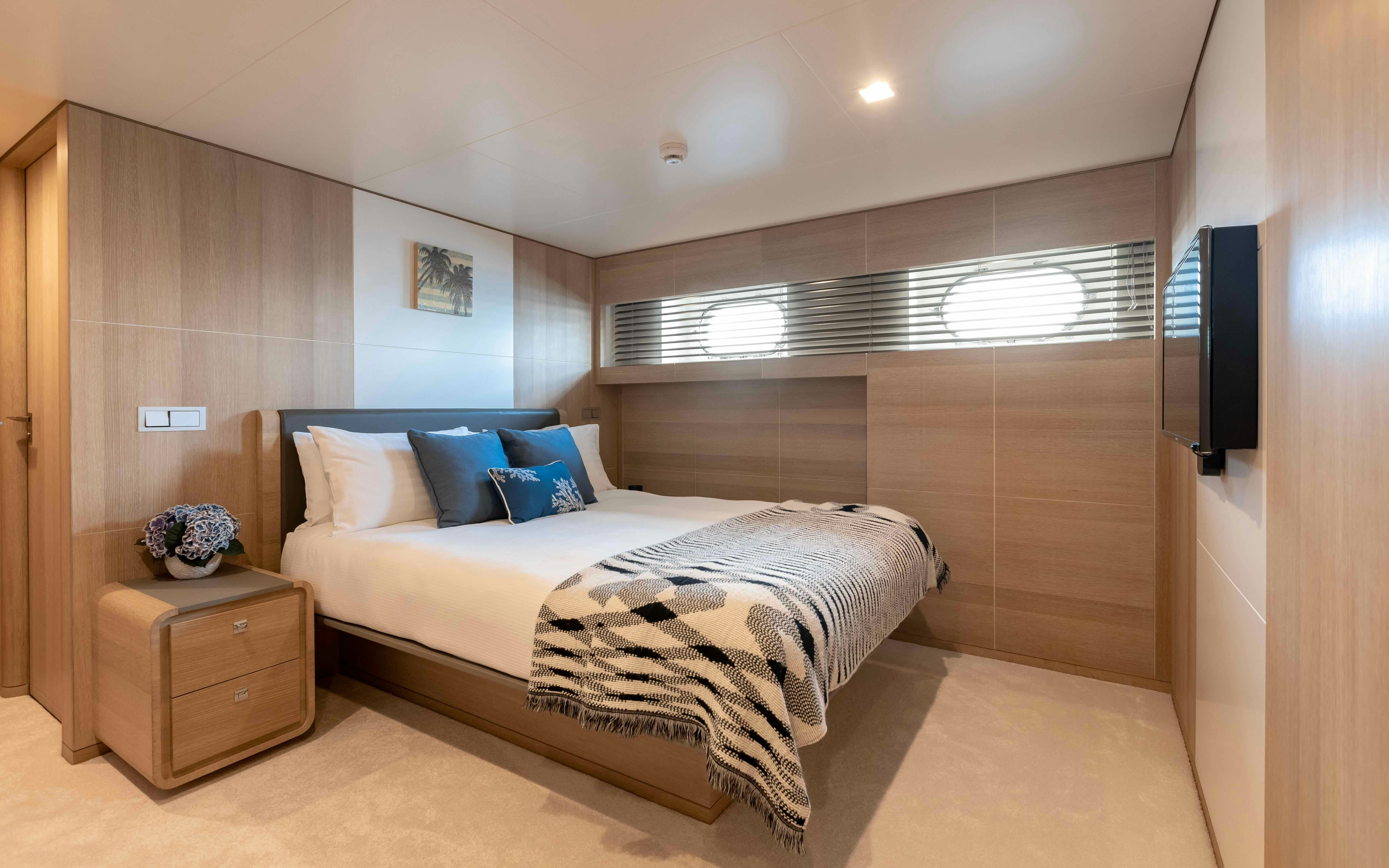 a bed in a room aboard ROBBIE BOBBY Yacht for Sale