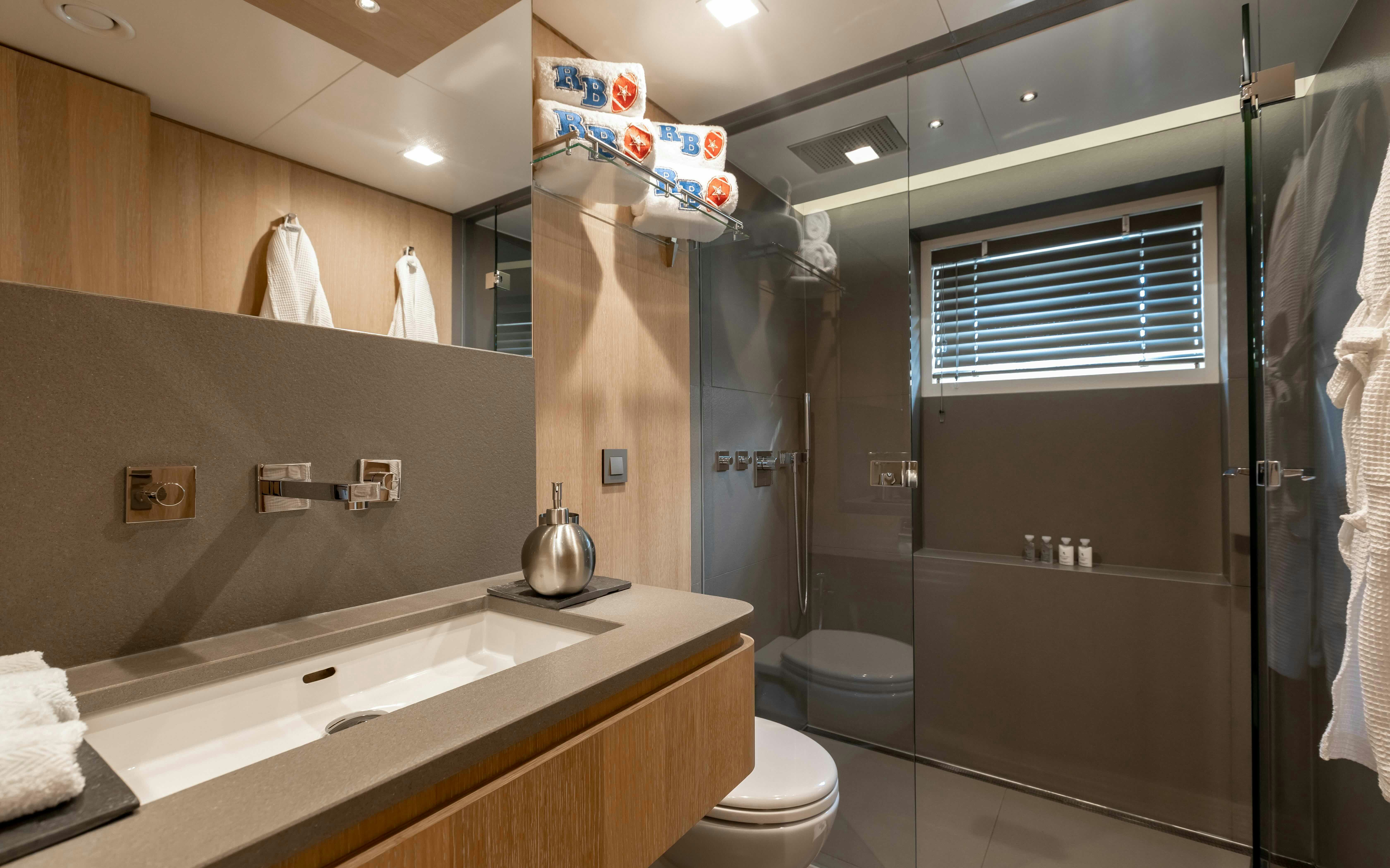 a bathroom with a large bathtub aboard ROBBIE BOBBY Yacht for Sale