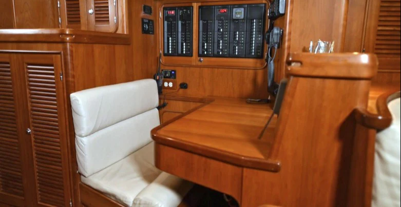 a chair and desk in a room aboard SAUCY FOX Yacht for Sale
