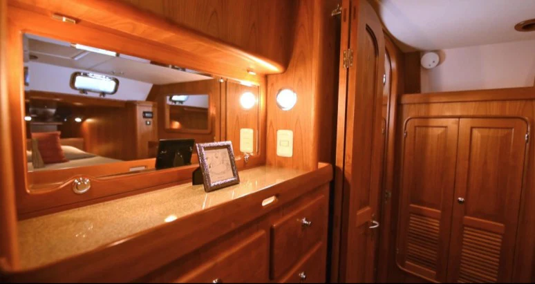 a room with wooden cabinets aboard SAUCY FOX Yacht for Sale