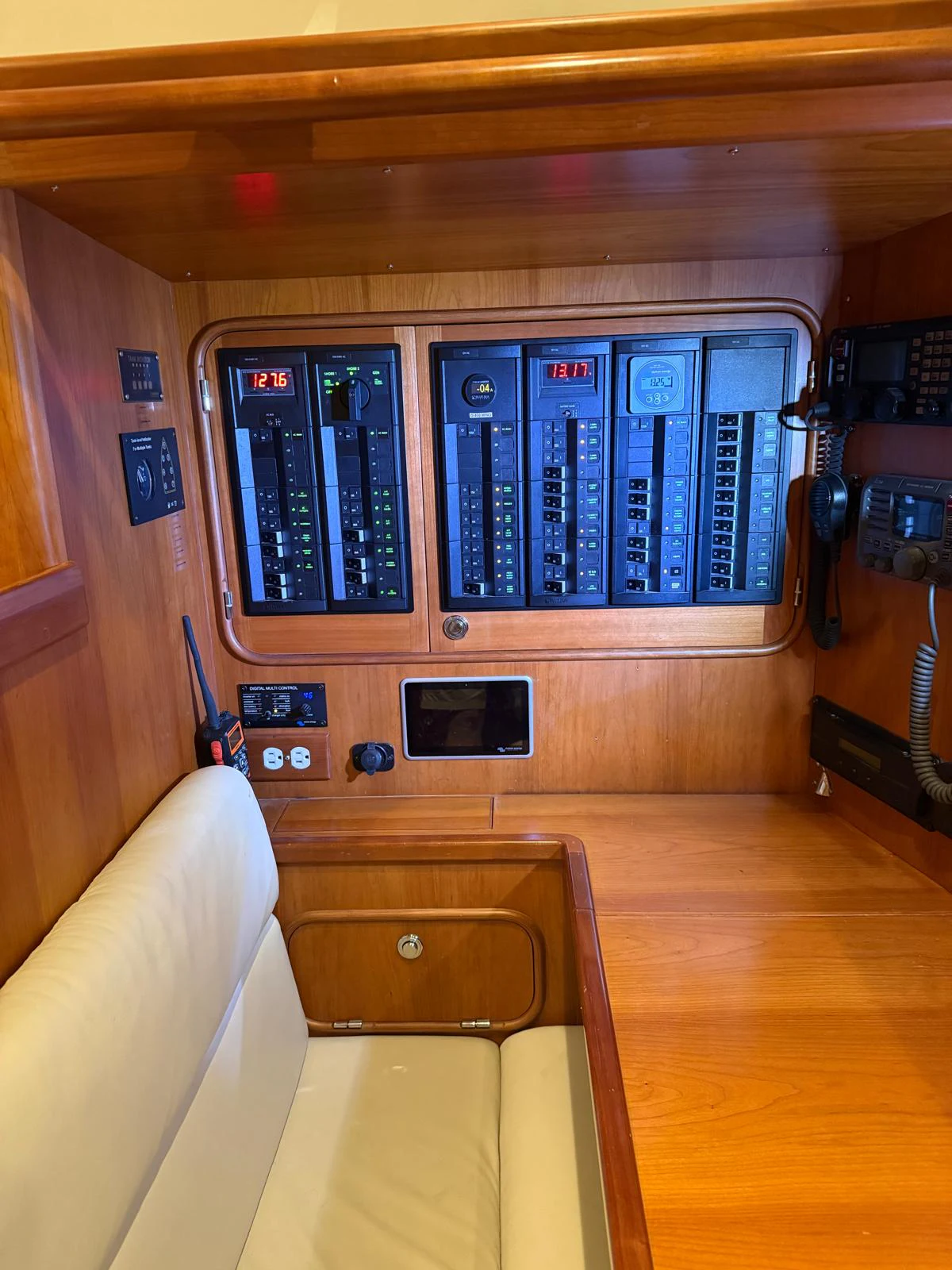 a room with a couch and a television aboard SAUCY FOX Yacht for Sale