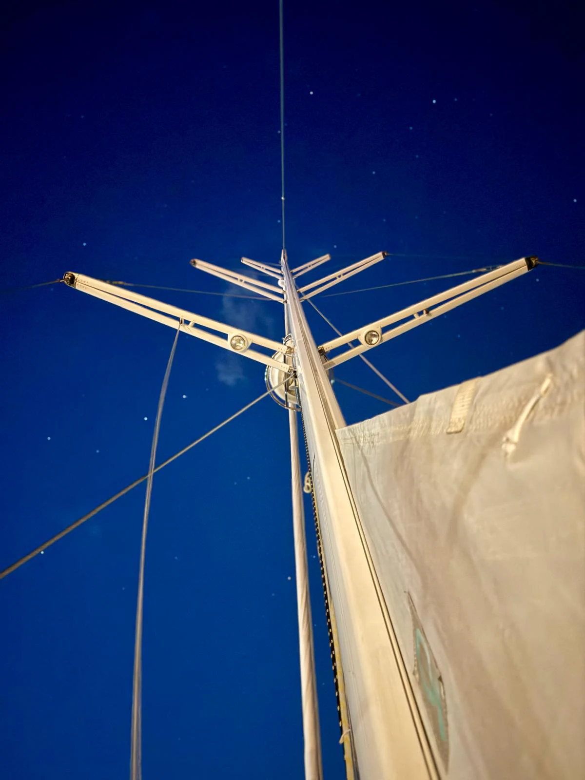 a white wind turbine aboard SAUCY FOX Yacht for Sale