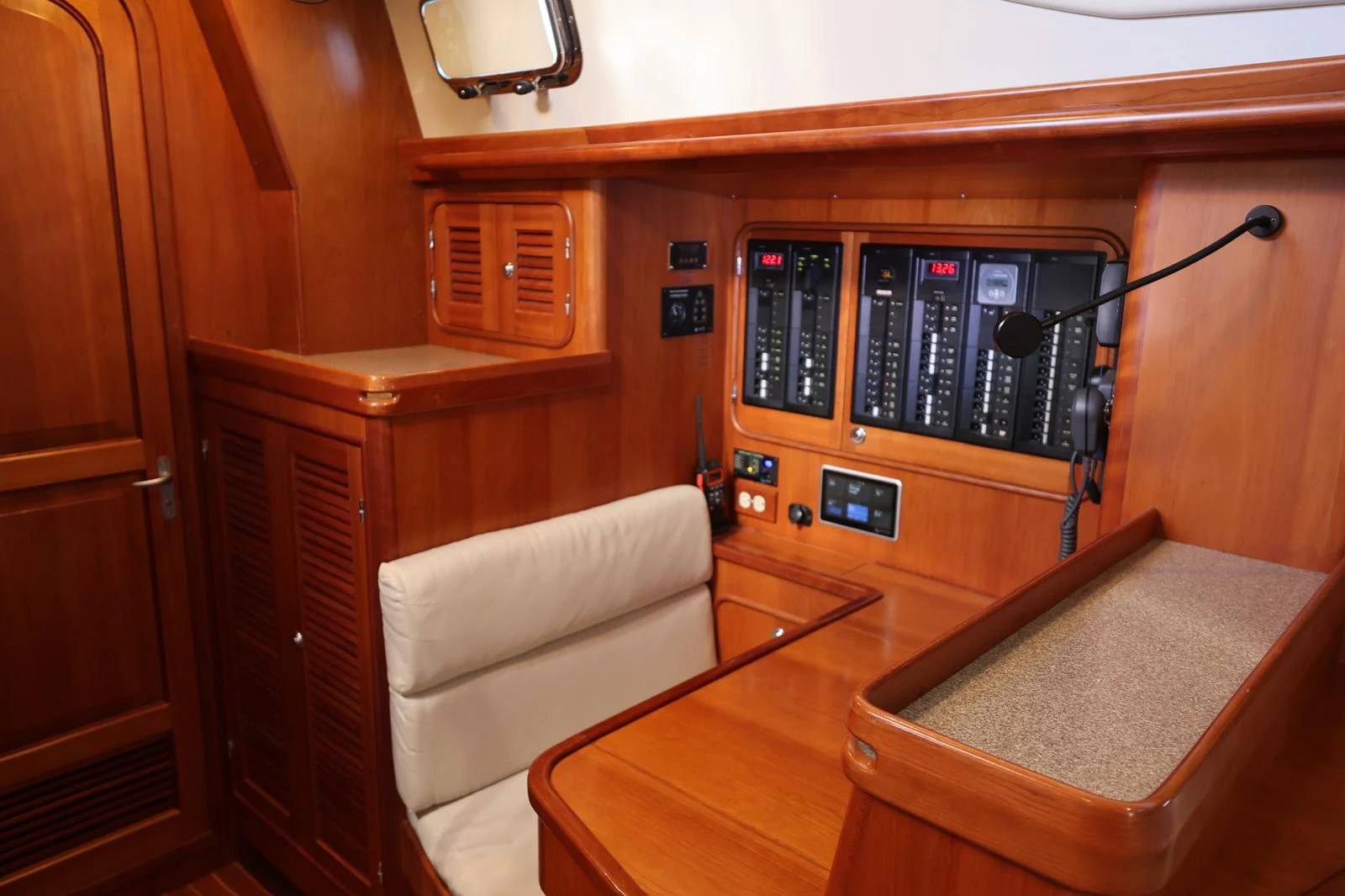 a room with a bed and a desk aboard SAUCY FOX Yacht for Sale