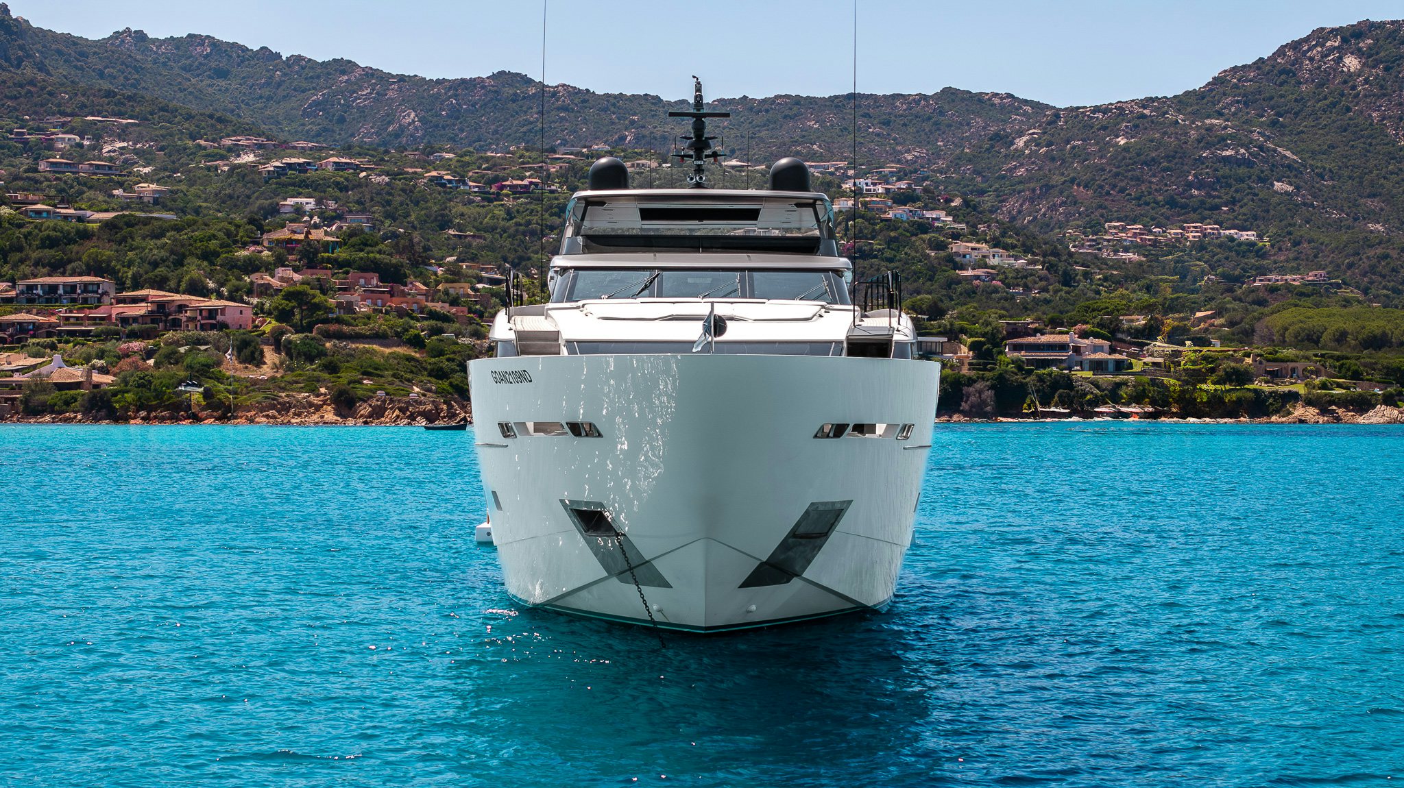 a white boat in the water aboard BLUE ANGEL Yacht for Sale