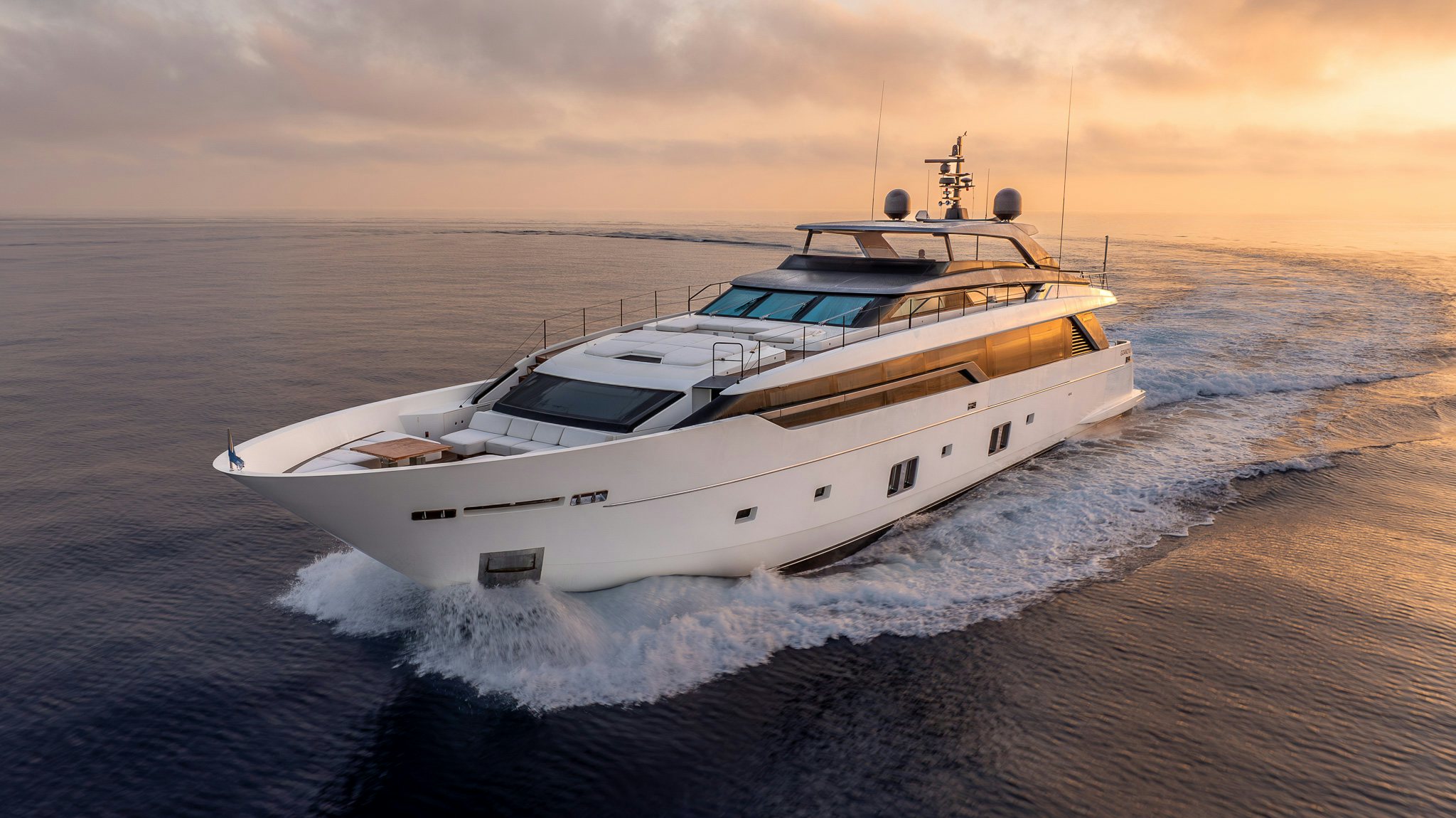 a white yacht on the beach aboard BLUE ANGEL Yacht for Sale